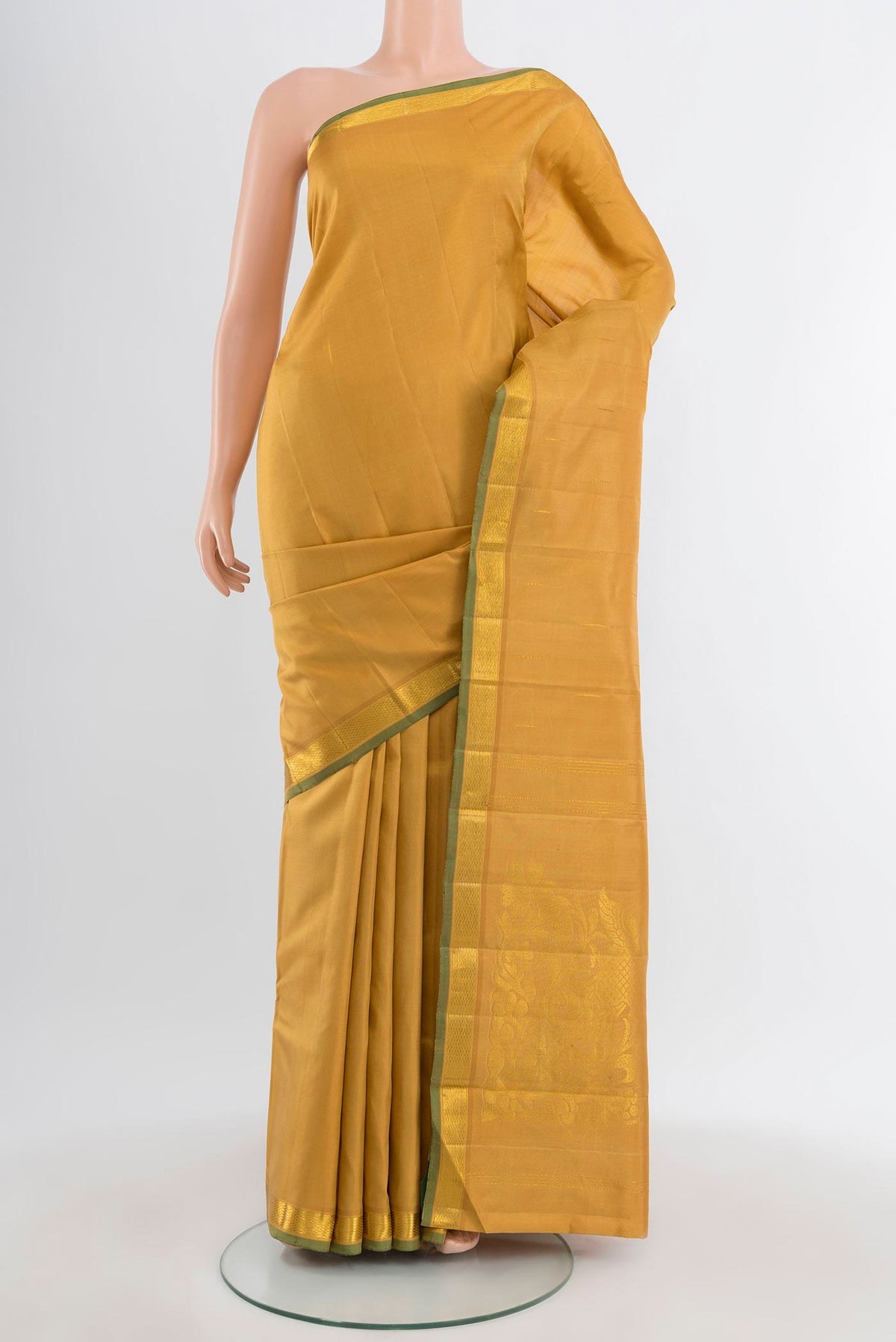 Pure Silk Pure Zari Sandal Kanjivaram Saree with Plain Body and Zari Border.  displayed on a mannequin