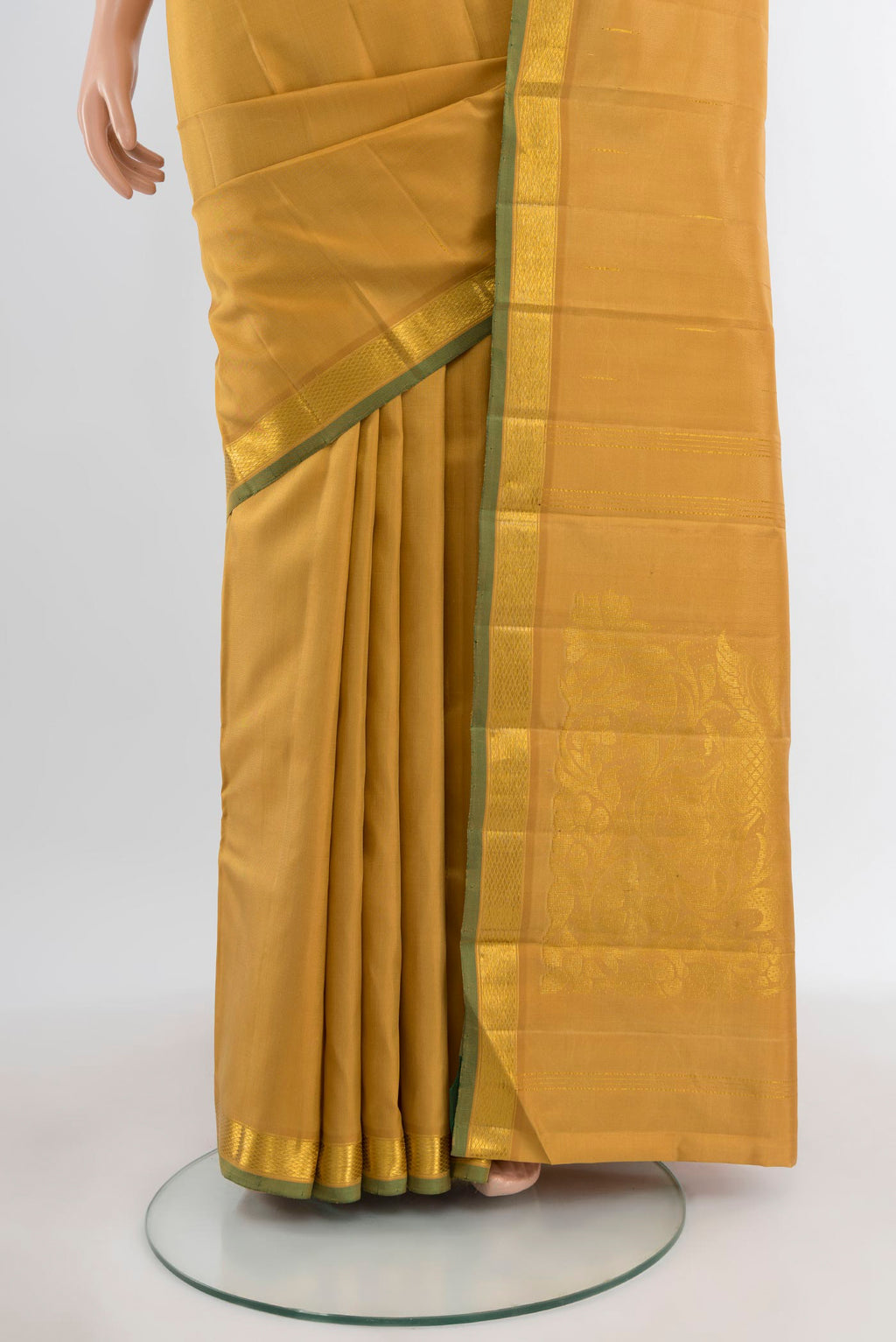 Pleats and pallu of Pure Silk Pure Zari Sandal Kanjivaram Saree with Plain Body and Zari Border. 