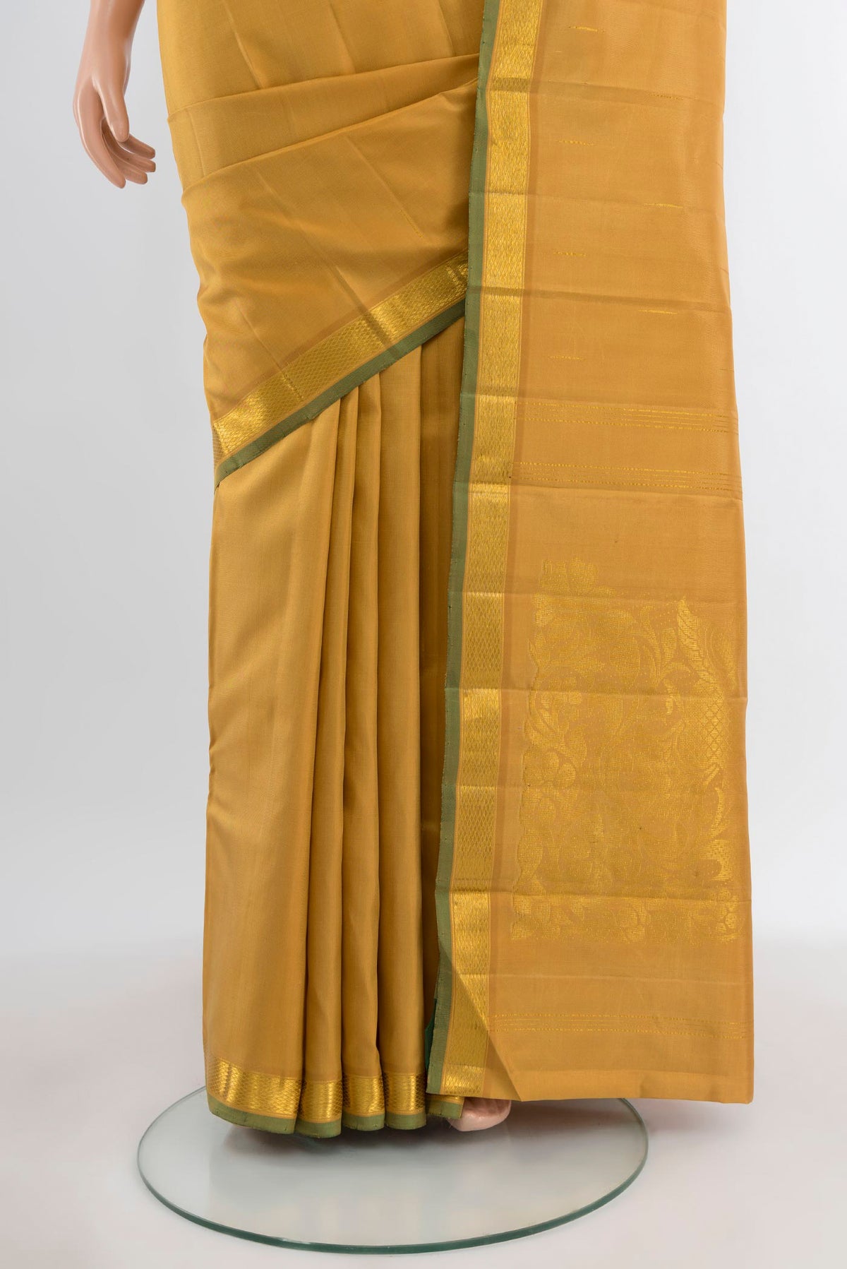 Pleats and pallu of Pure Silk Pure Zari Sandal Kanjivaram Saree with Plain Body and Zari Border. 