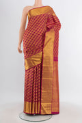 Magenta Kanchipuram Silk Saree with Zari Brocade on the body and Zari Border.  displayed on a mannequin