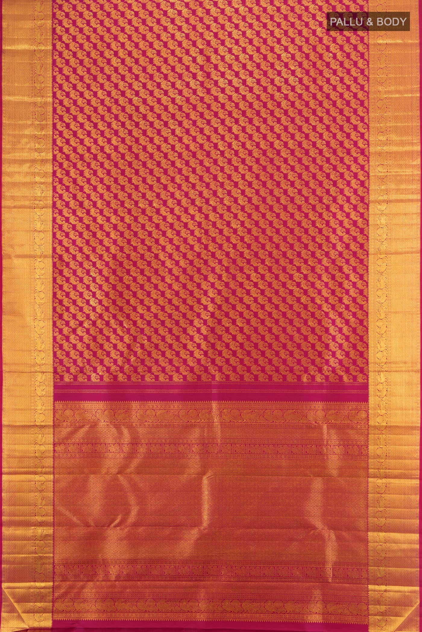 Flat view of Magenta Kanchipuram Silk Saree with Zari Brocade on the body and Zari Border. 
