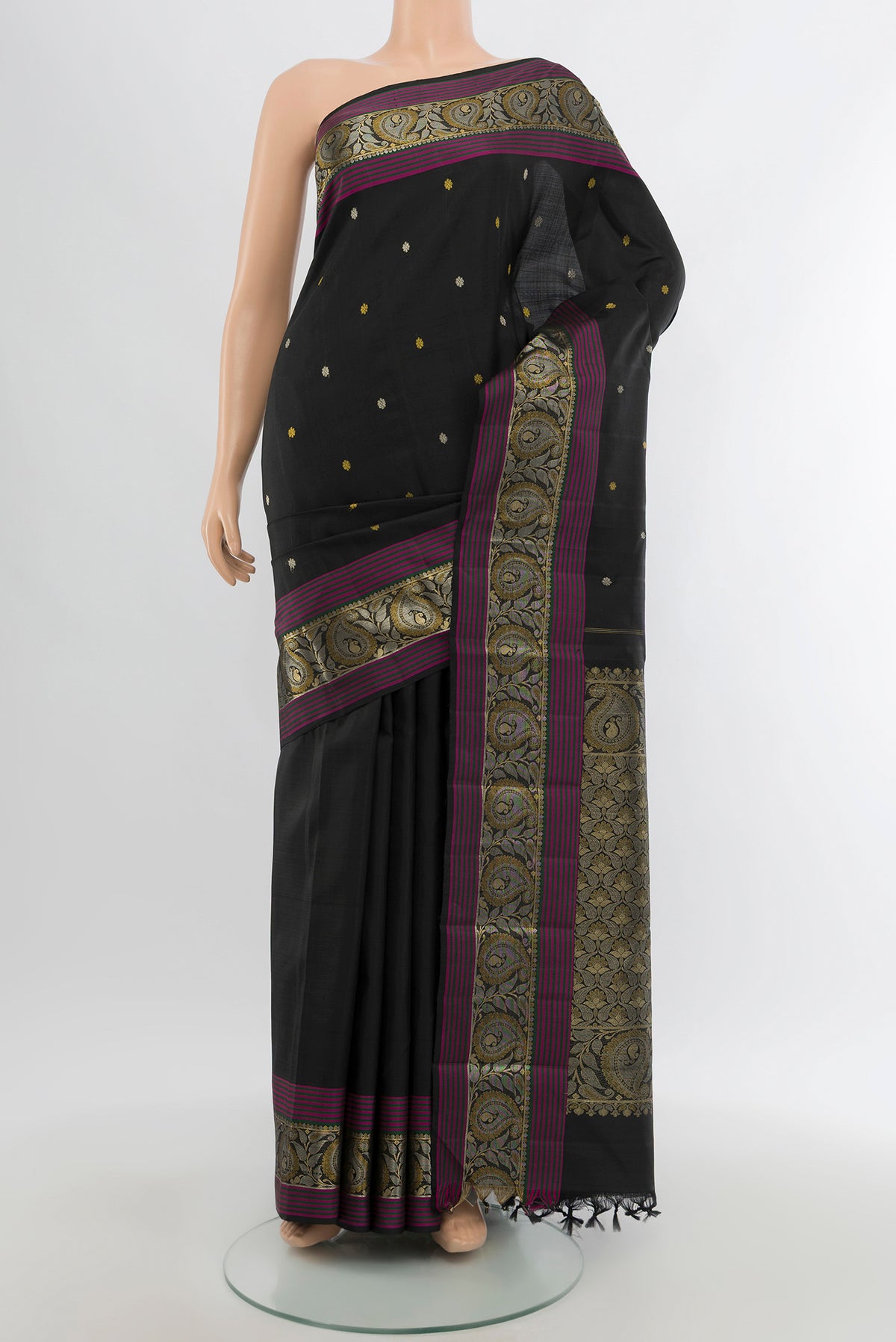 Black Kanjivaram Silk Saree with Zari Butta on the body and Zari Border.  displayed on a mannequin