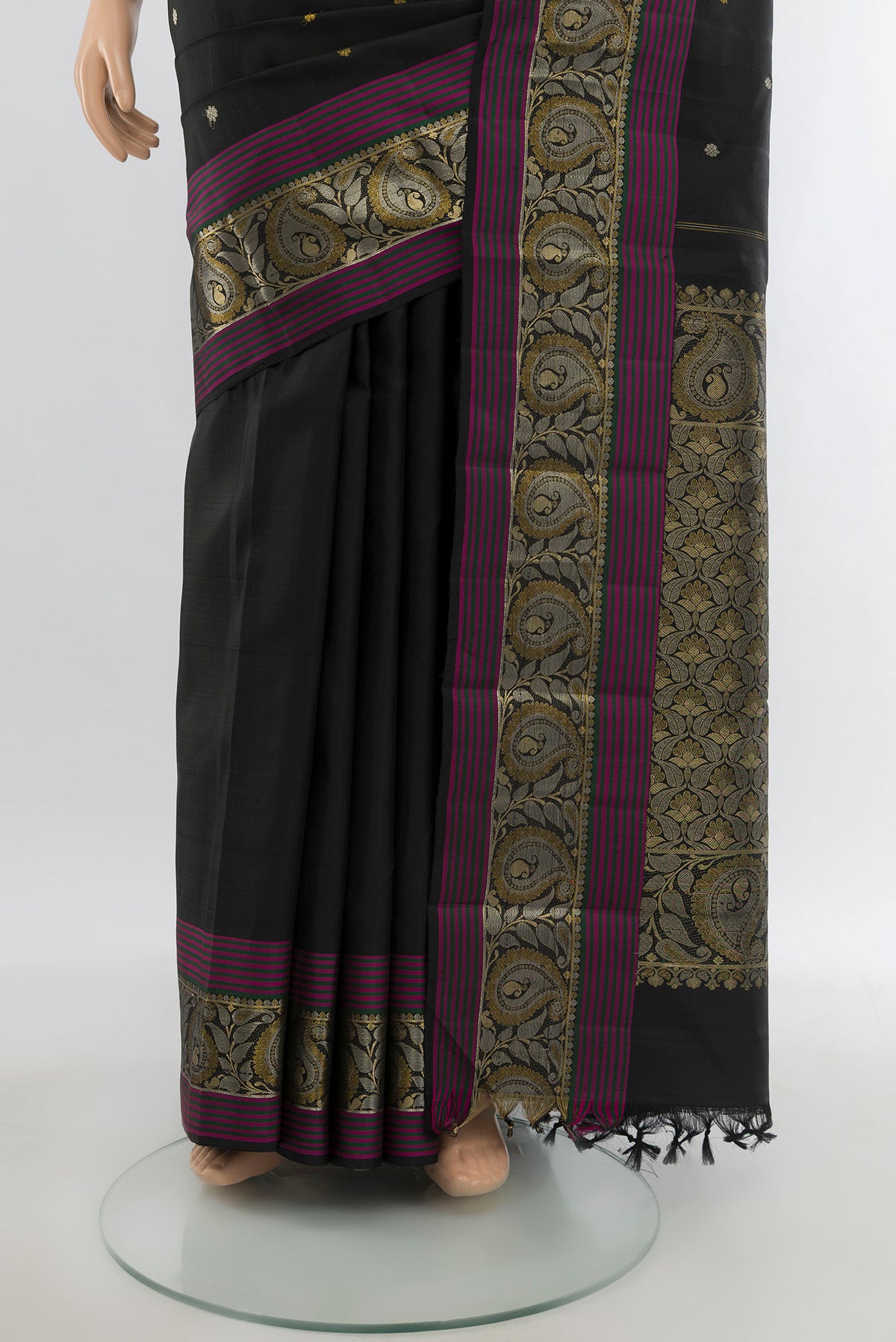 Pleats and pallu of Black Kanjivaram Silk Saree with Zari Butta on the body and Zari Border. 