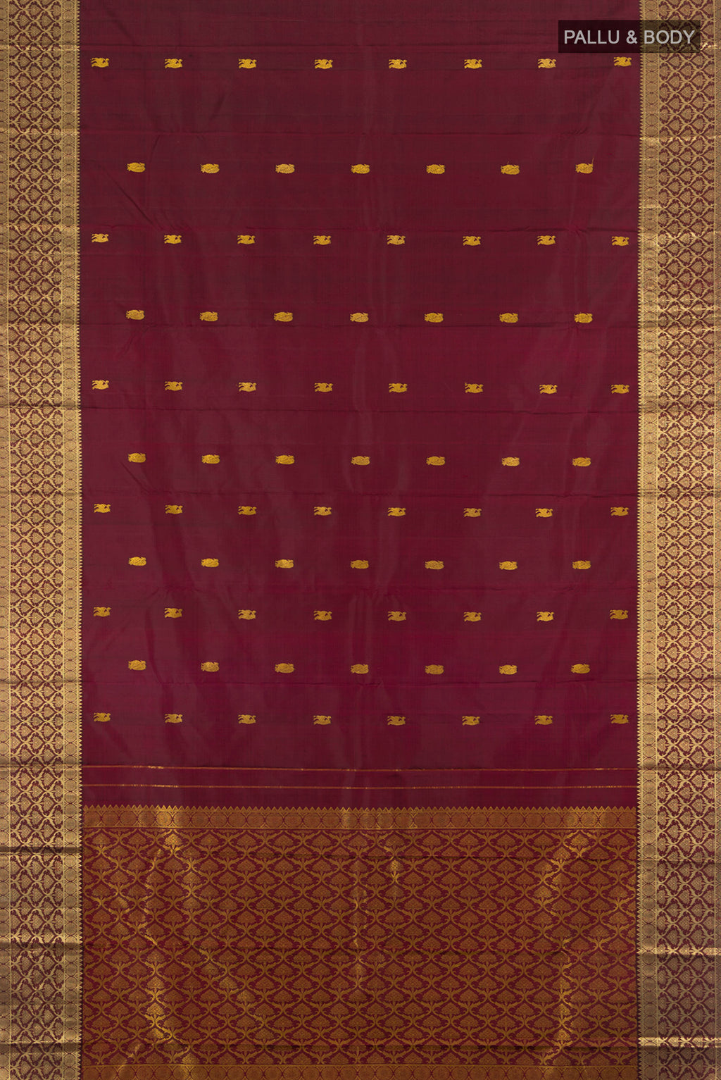 Flat view of Maroon Kanjivaram Silk Saree with Thread Butta on the body and Zari Border. 