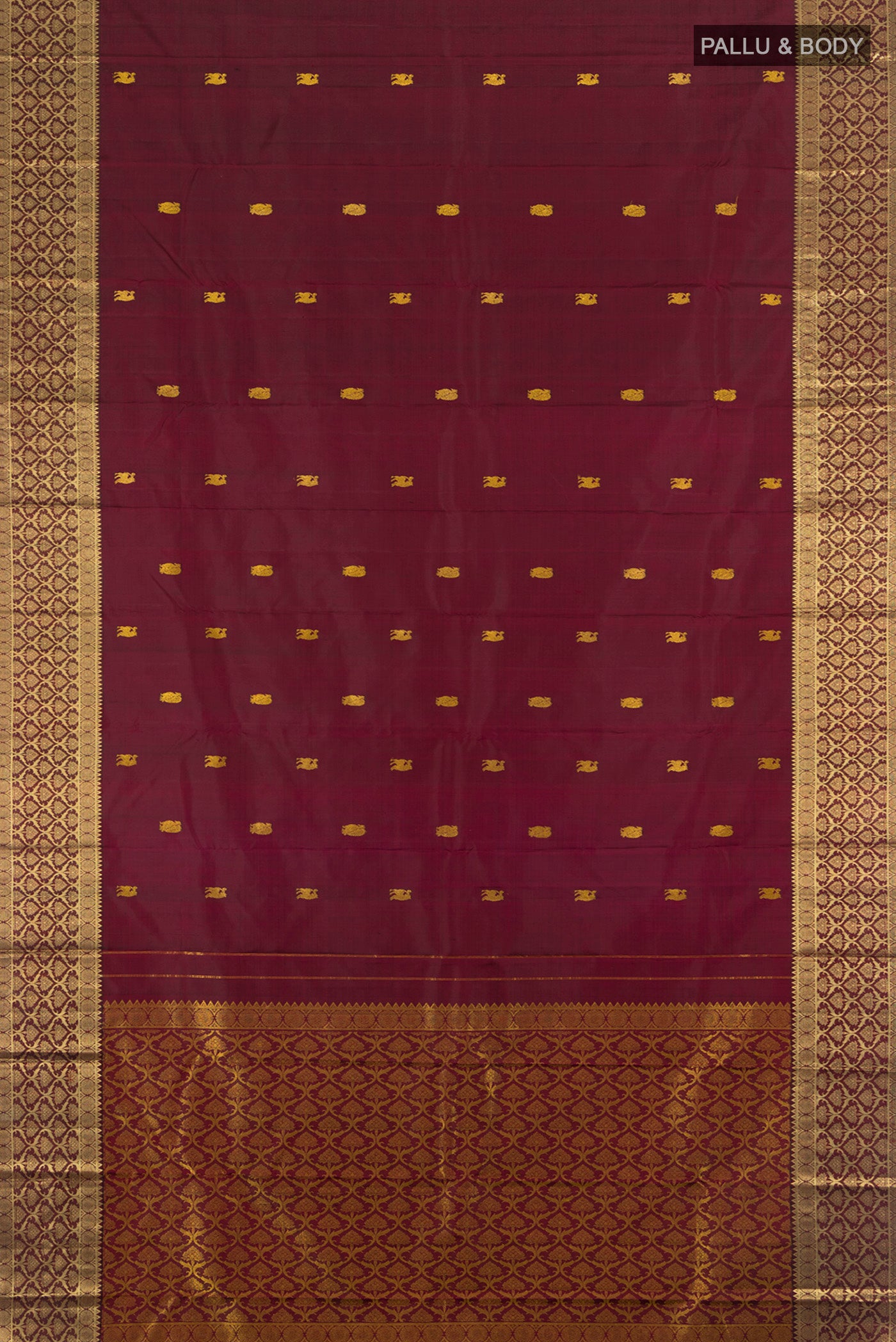 Flat view of Maroon Kanjivaram Silk Saree with Thread Butta on the body and Zari Border. 