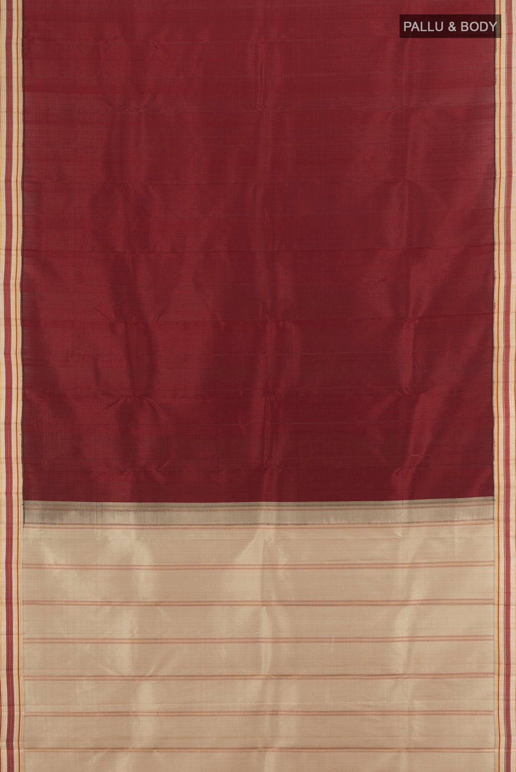 Flat view of Maroon Kanjivaram Silk Saree with Plain Body and Thread Border. 