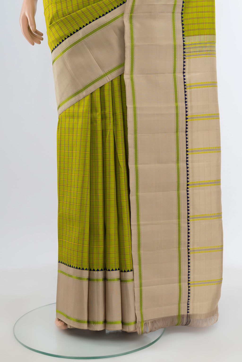 Pleats and pallu of Light Green Kanjivaram Silk Saree with Checked design on the body and Plain Border. 