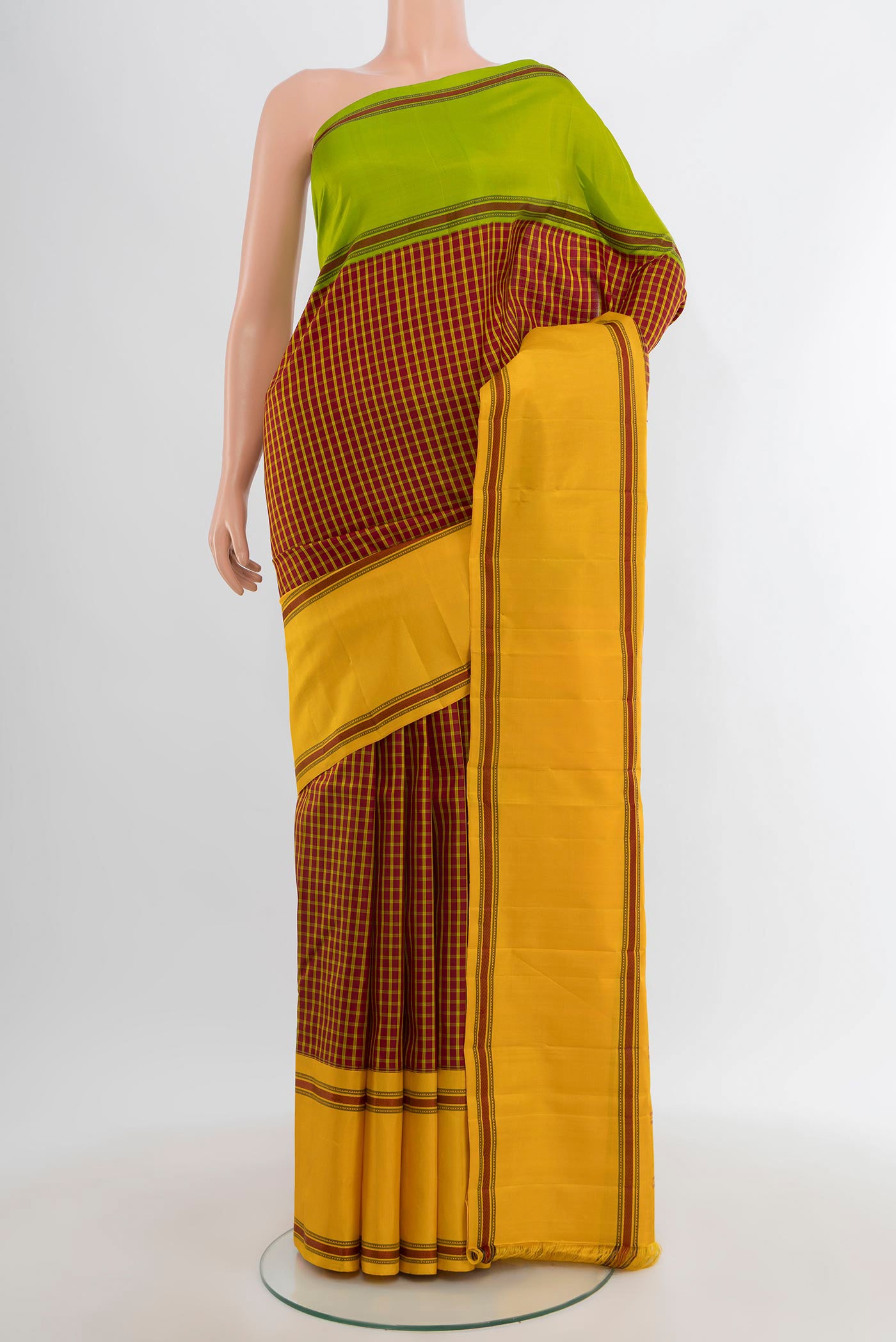 Maroon Kanchipuram Silk Saree with Checked design on the body and Thread Border.  displayed on a mannequin