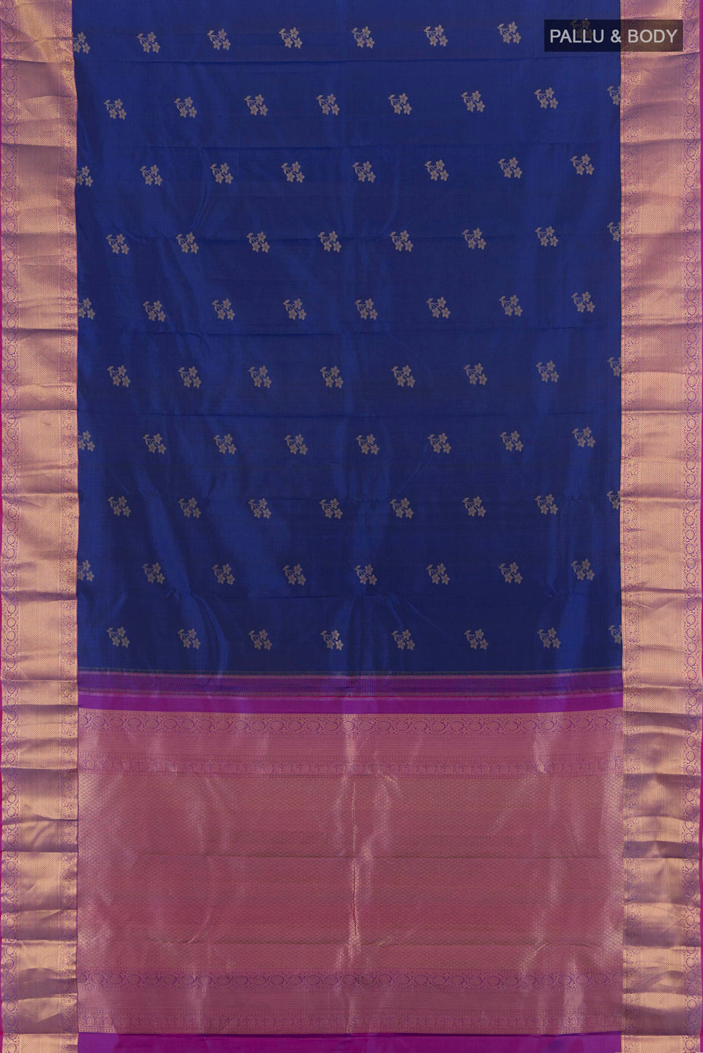 Flat view of Dark Blue Kanjivaram Silk Saree with Zari Butta on the body and Zari Border. 