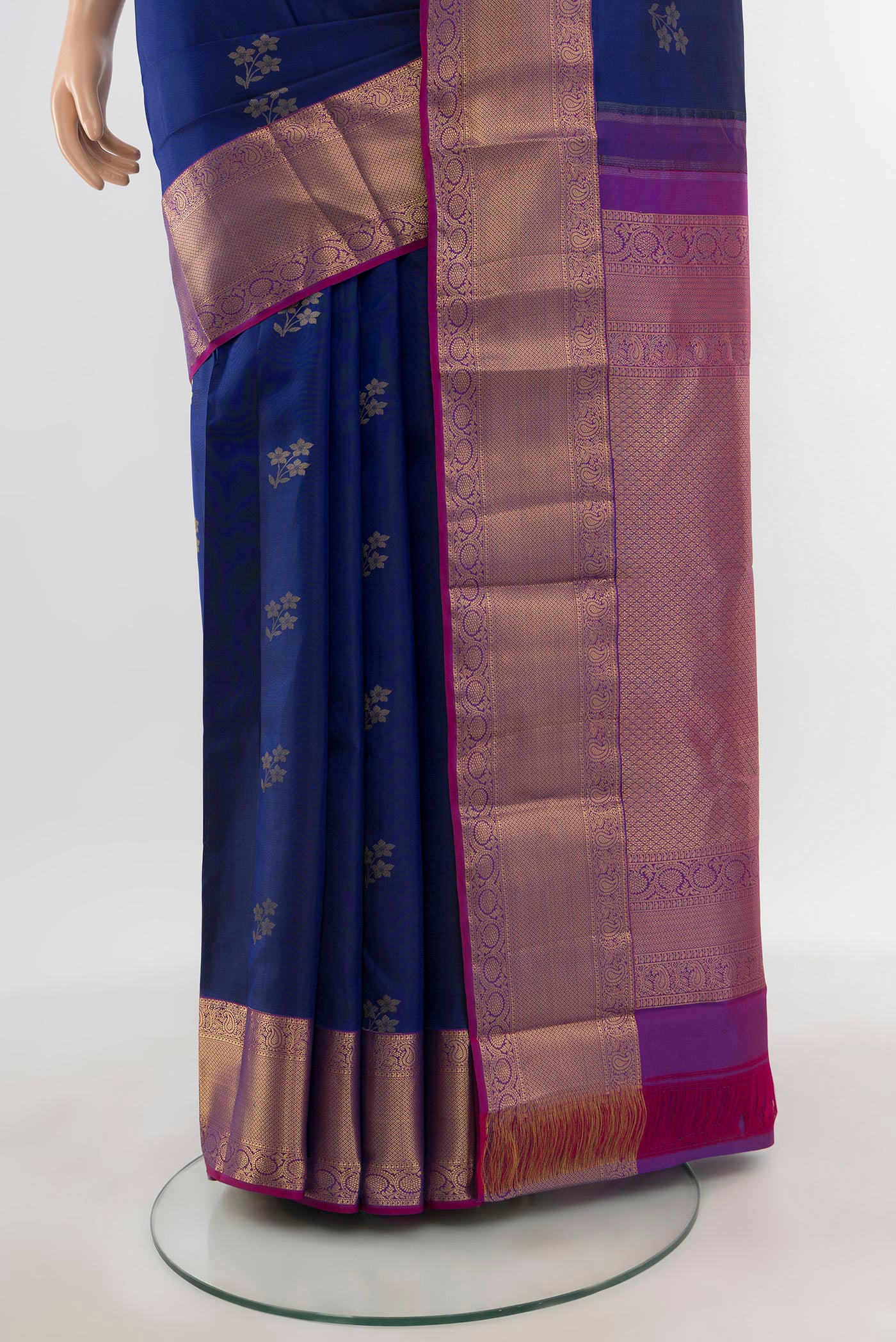 Pleats and pallu of Dark Blue Kanjivaram Silk Saree with Zari Butta on the body and Zari Border. 