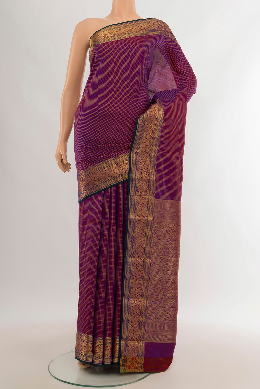 Purple Kanchipuram Silk Saree with Checked design on the body and Zari Border.  displayed on a mannequin