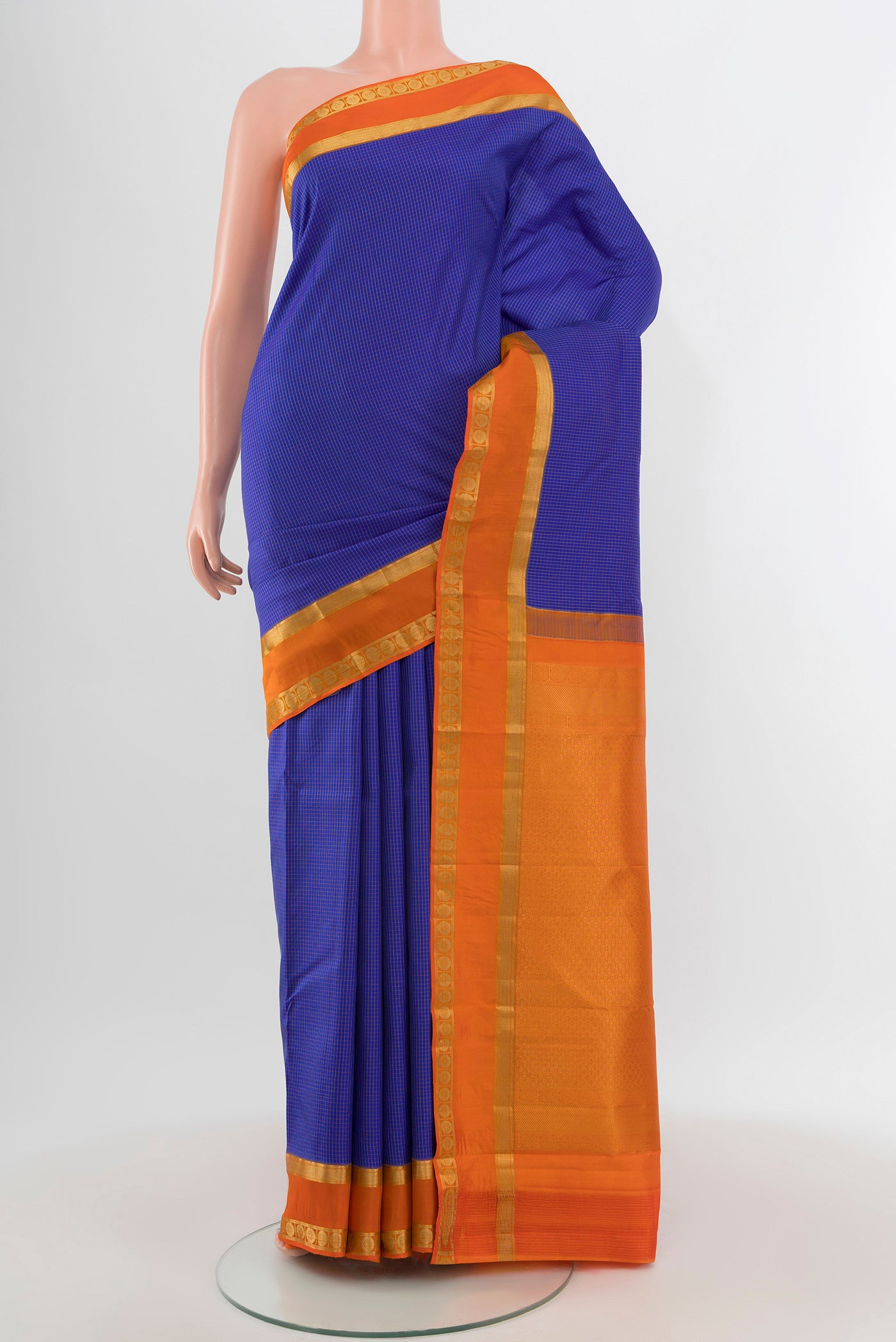 Royal Blue Kanjivaram Silk Saree with Checked design on the body and Zari Border.  displayed on a mannequin