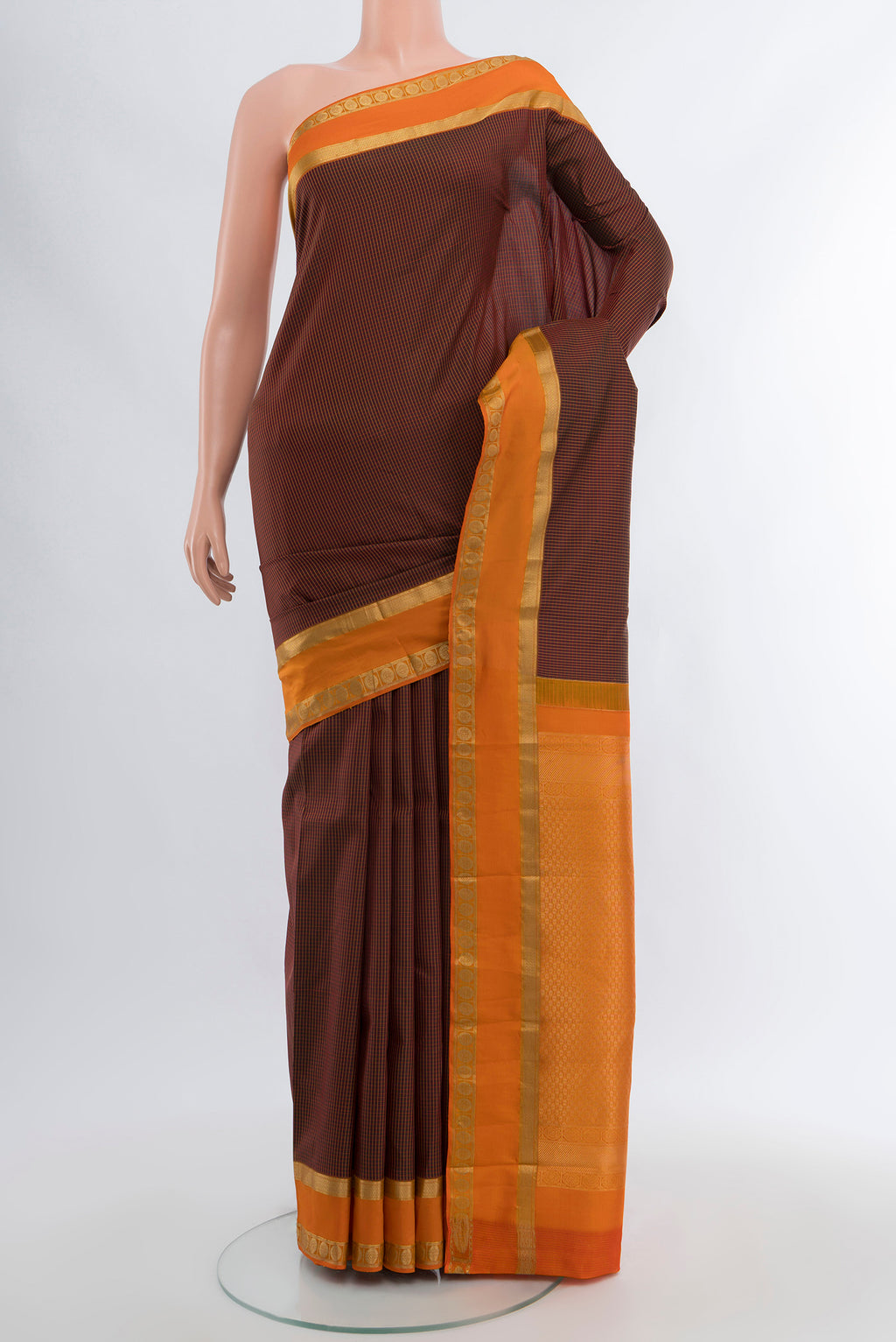 Coffee Brown Kanjivaram Silk Saree with Checked design on the body and Zari Border.  displayed on a mannequin