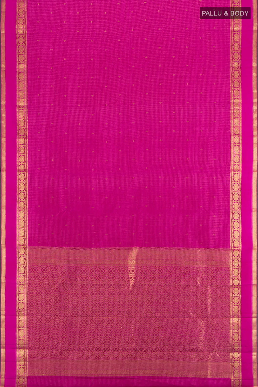 Flat view of Magenta Kanjivaram Silk Saree with Zari Butta on the body and Zari Border. 