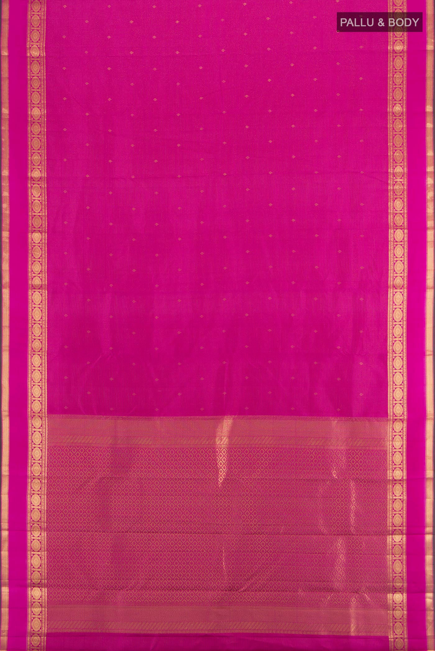 Flat view of Magenta Kanjivaram Silk Saree with Zari Butta on the body and Zari Border. 