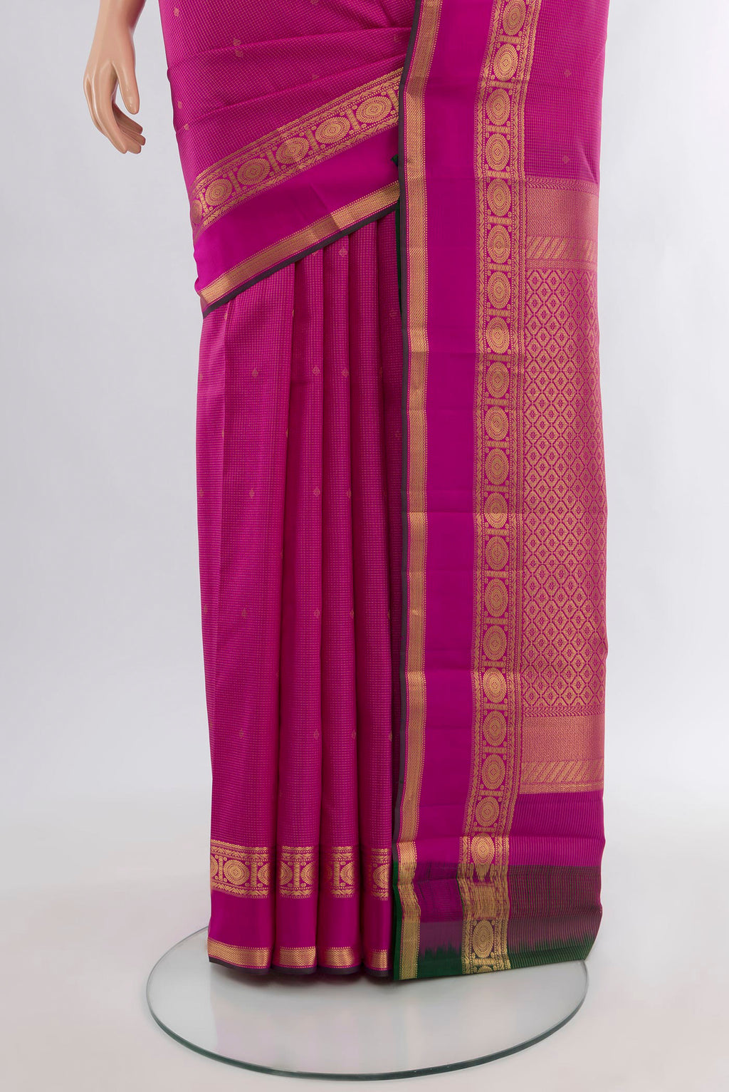 Pleats and pallu of Magenta Kanjivaram Silk Saree with Zari Butta on the body and Zari Border. 