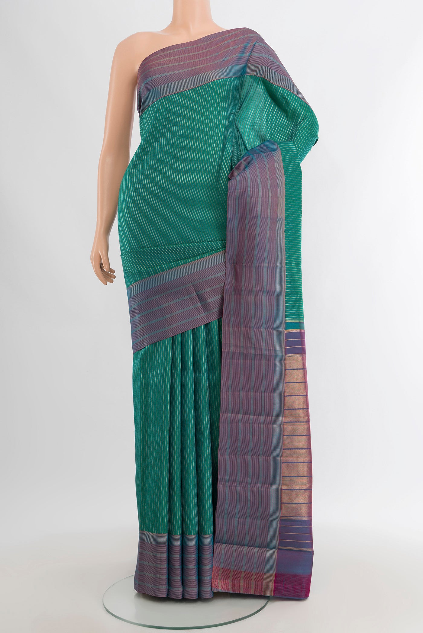 Sea Green Kanchipuram Silk Saree with Stripes on the body and Zari Border.  displayed on a mannequin