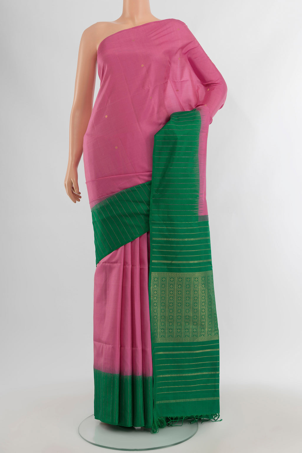Rose pink Soft Silk Saree with Zari Butta on the body and Plain Border.  displayed on a mannequin