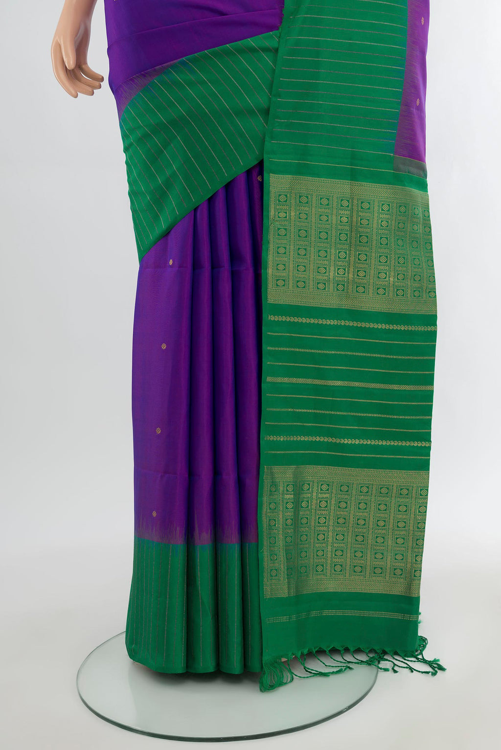 Pleats and pallu of Purple Soft Silk Saree with Zari Butta on the body and Without Border. 