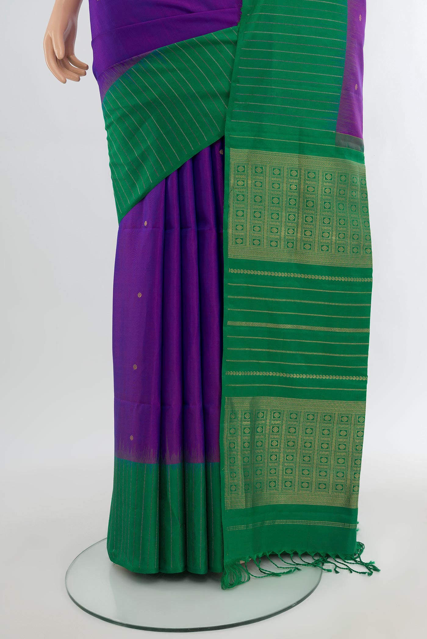 Pleats and pallu of Purple Soft Silk Saree with Zari Butta on the body and Without Border. 