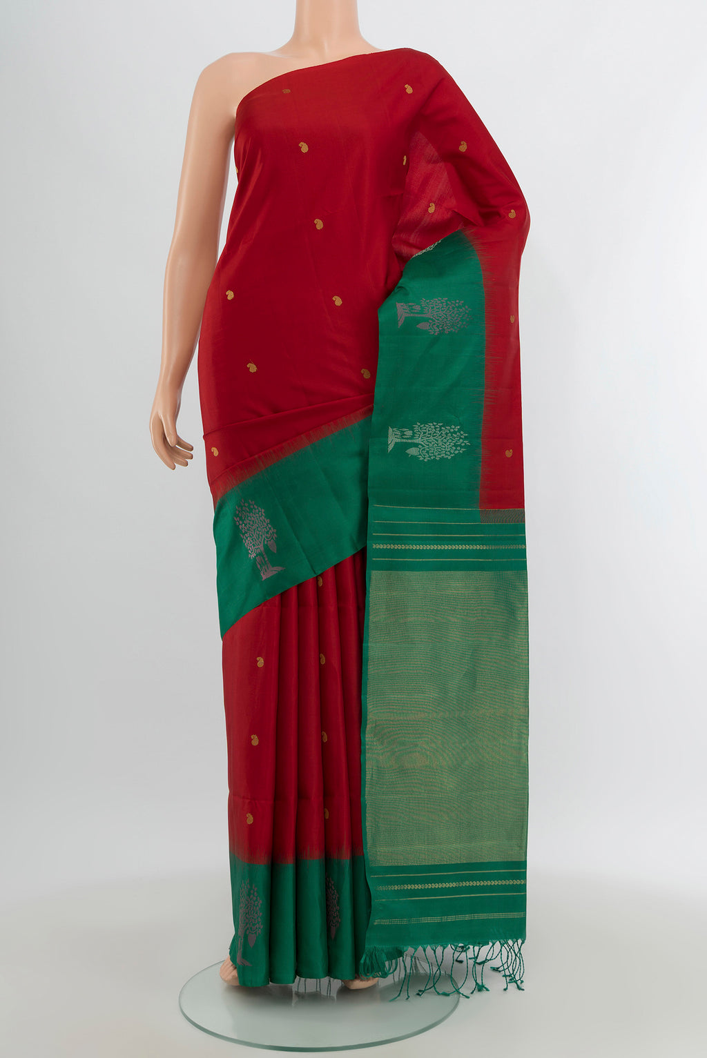 Red Soft Silk Saree with Zari Butta on the body and Fancy Border.  displayed on a mannequin