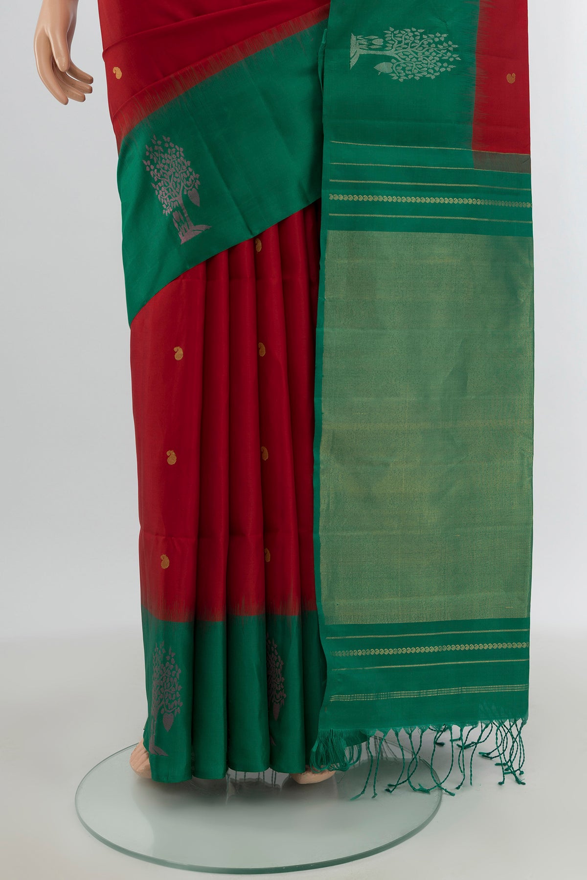 Pleats and pallu of Red Soft Silk Saree with Zari Butta on the body and Fancy Border. 