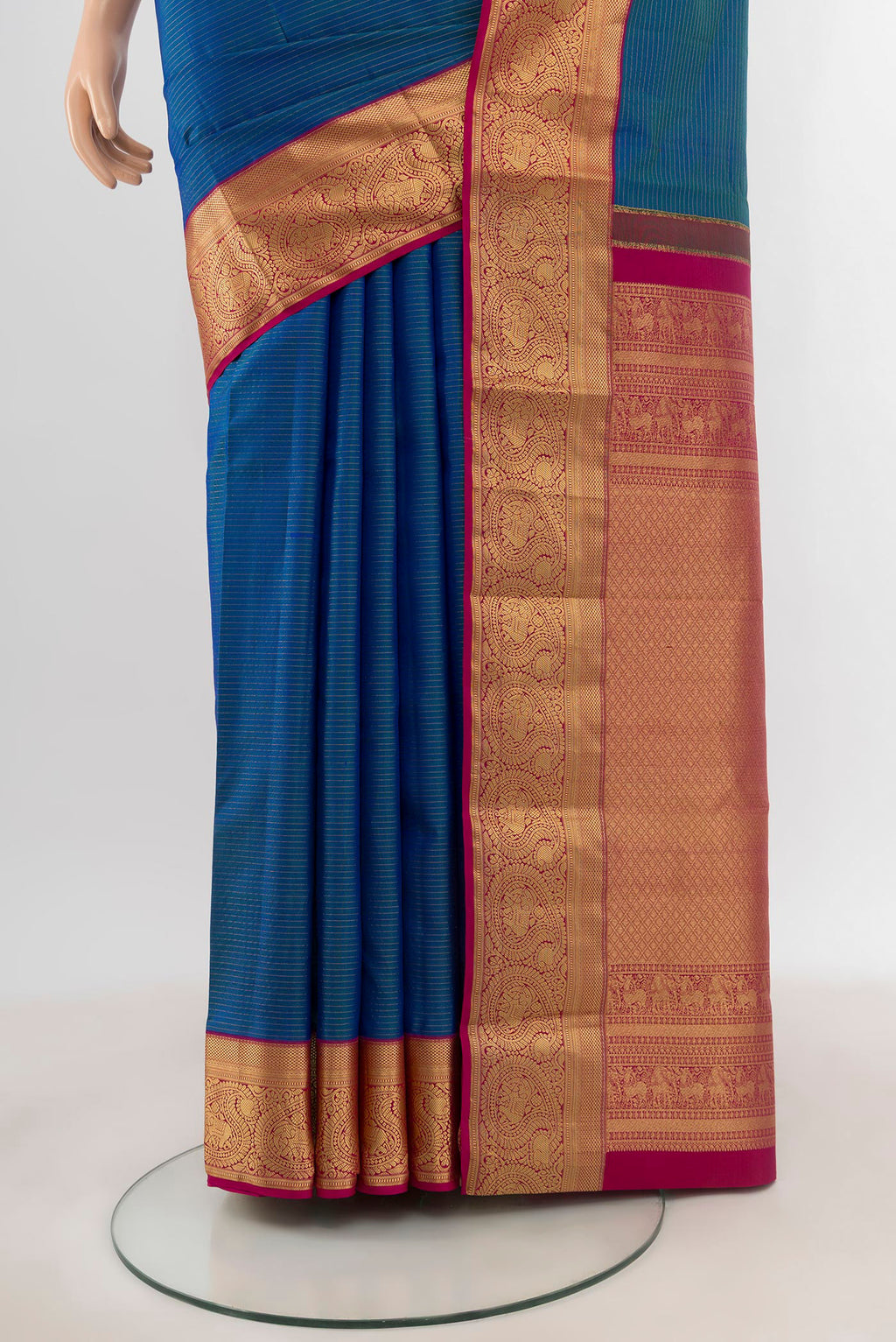 Pleats and pallu of Blue Kanchipuram Silk Saree with Zari Butta on the body and Zari Border. 