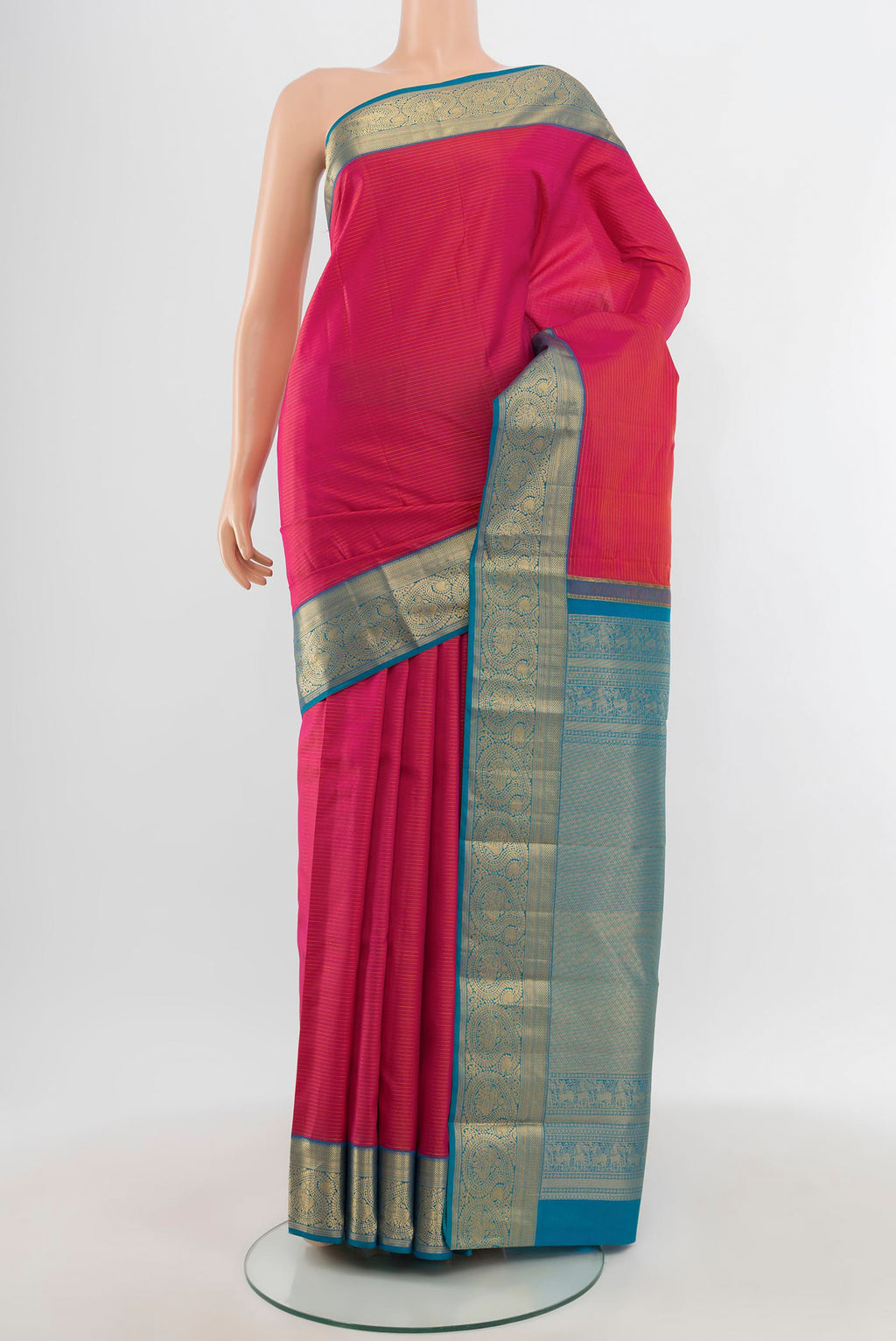 Pink Kanchipuram Silk Saree with Stripes on the body and Zari Border.  displayed on a mannequin