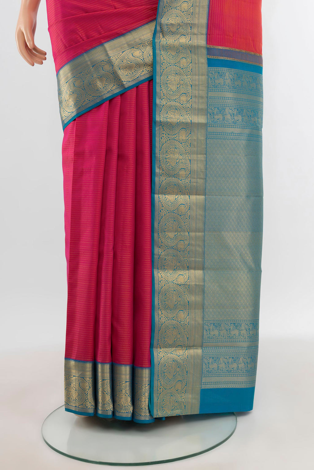 Pleats and pallu of Pink Kanchipuram Silk Saree with Stripes on the body and Zari Border. 