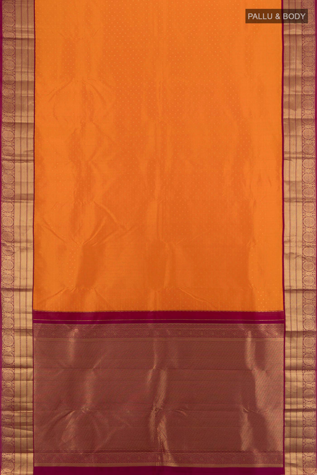 Flat view of Orange Kanchipuram Silk Saree with Zari Butta on the body and Zari Border. 