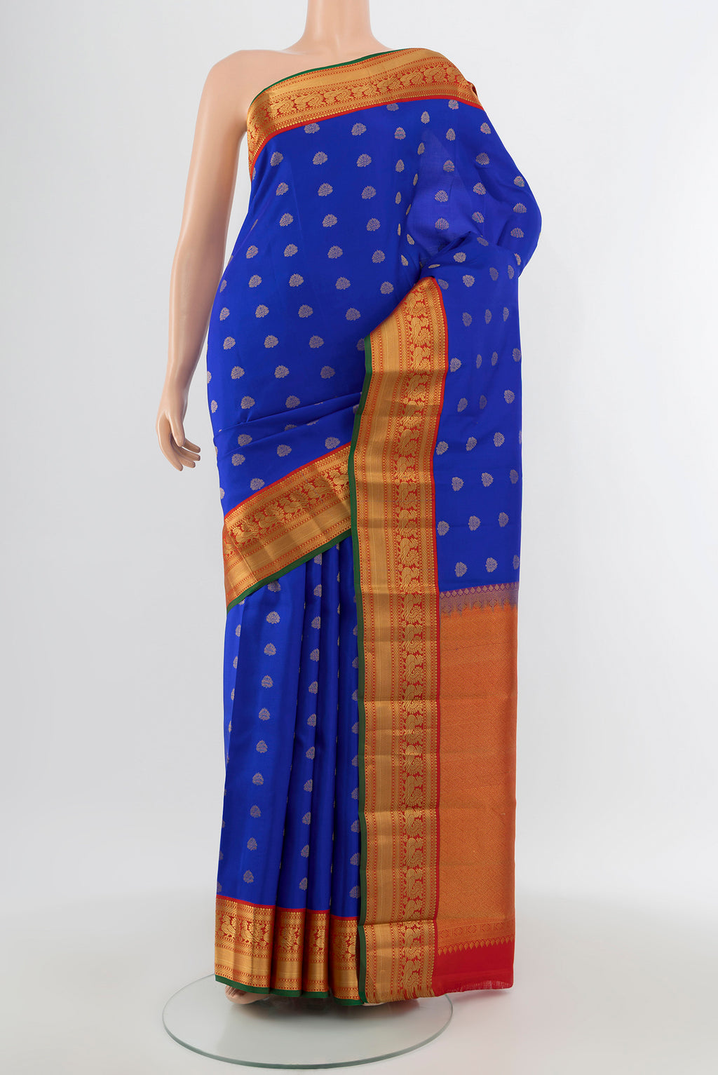Royal Blue Kanchipuram Silk Saree with Zari Butta on the body and Zari Border.  displayed on a mannequin