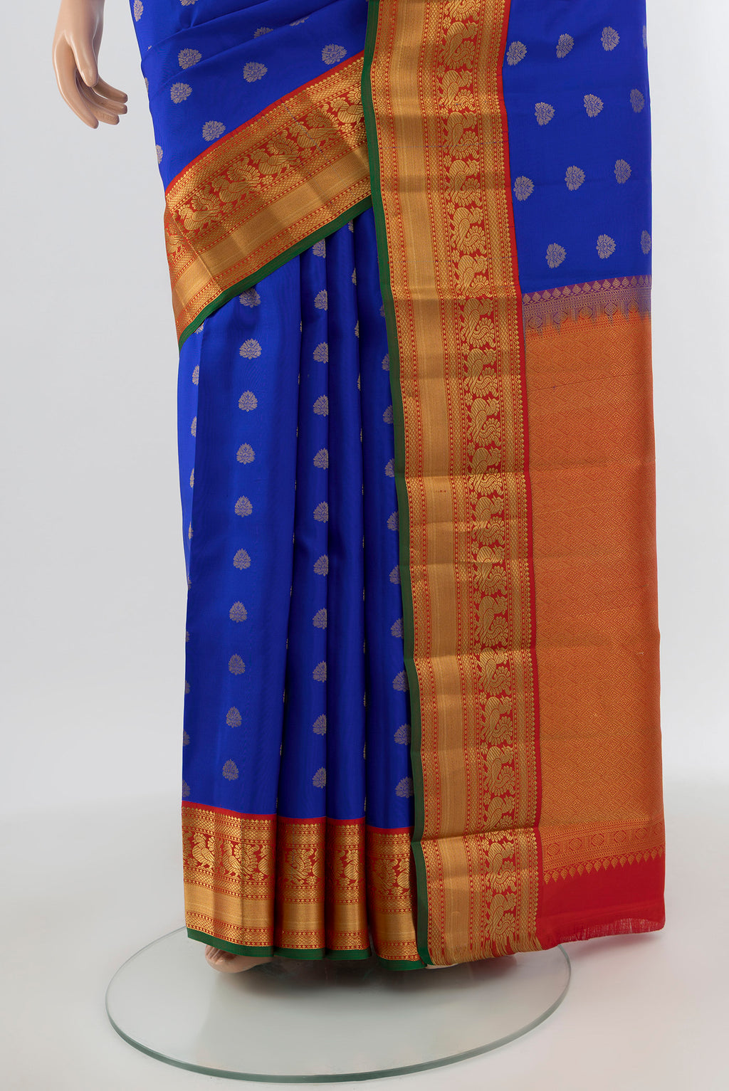 Pleats and pallu of Royal Blue Kanchipuram Silk Saree with Zari Butta on the body and Zari Border. 