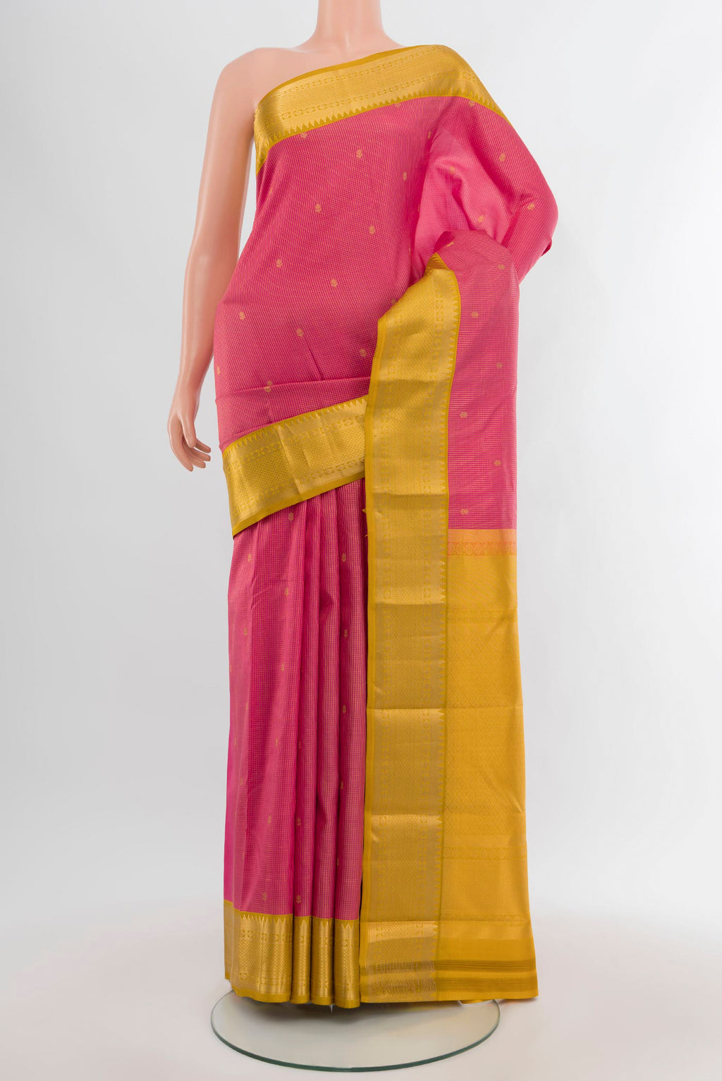 Pink Kanjivaram Silk Saree with Zari Butta on the body and Zari Border.  displayed on a mannequin