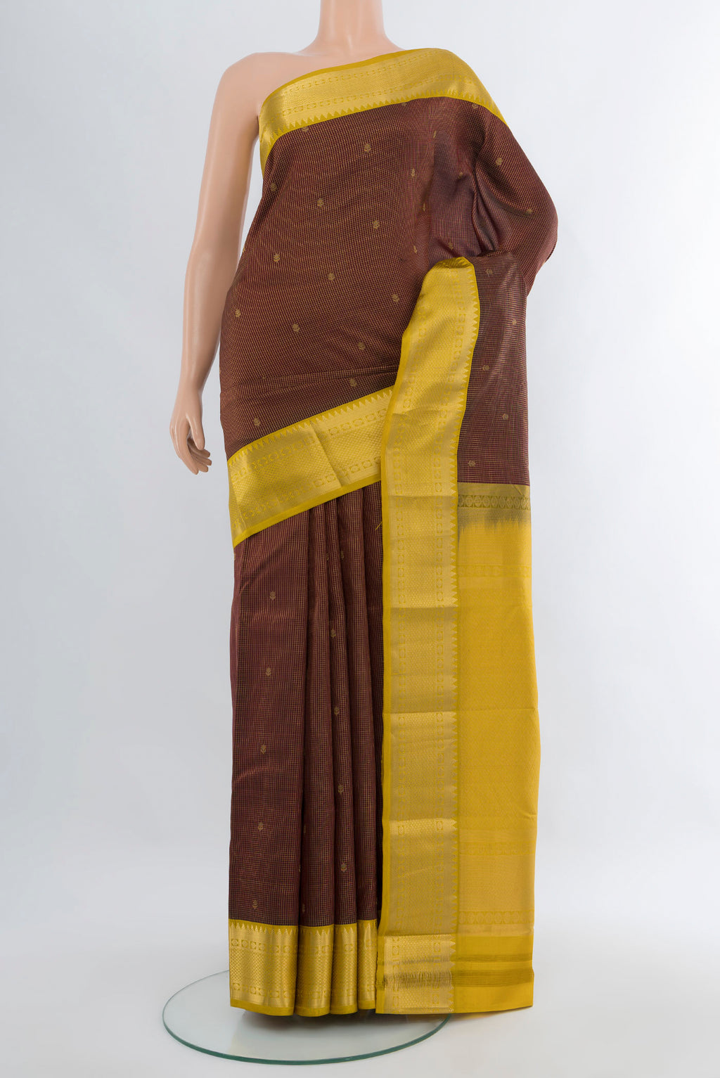 Coffee Brown Kanjivaram Silk Saree with Zari Butta on the body and Zari Border.  displayed on a mannequin