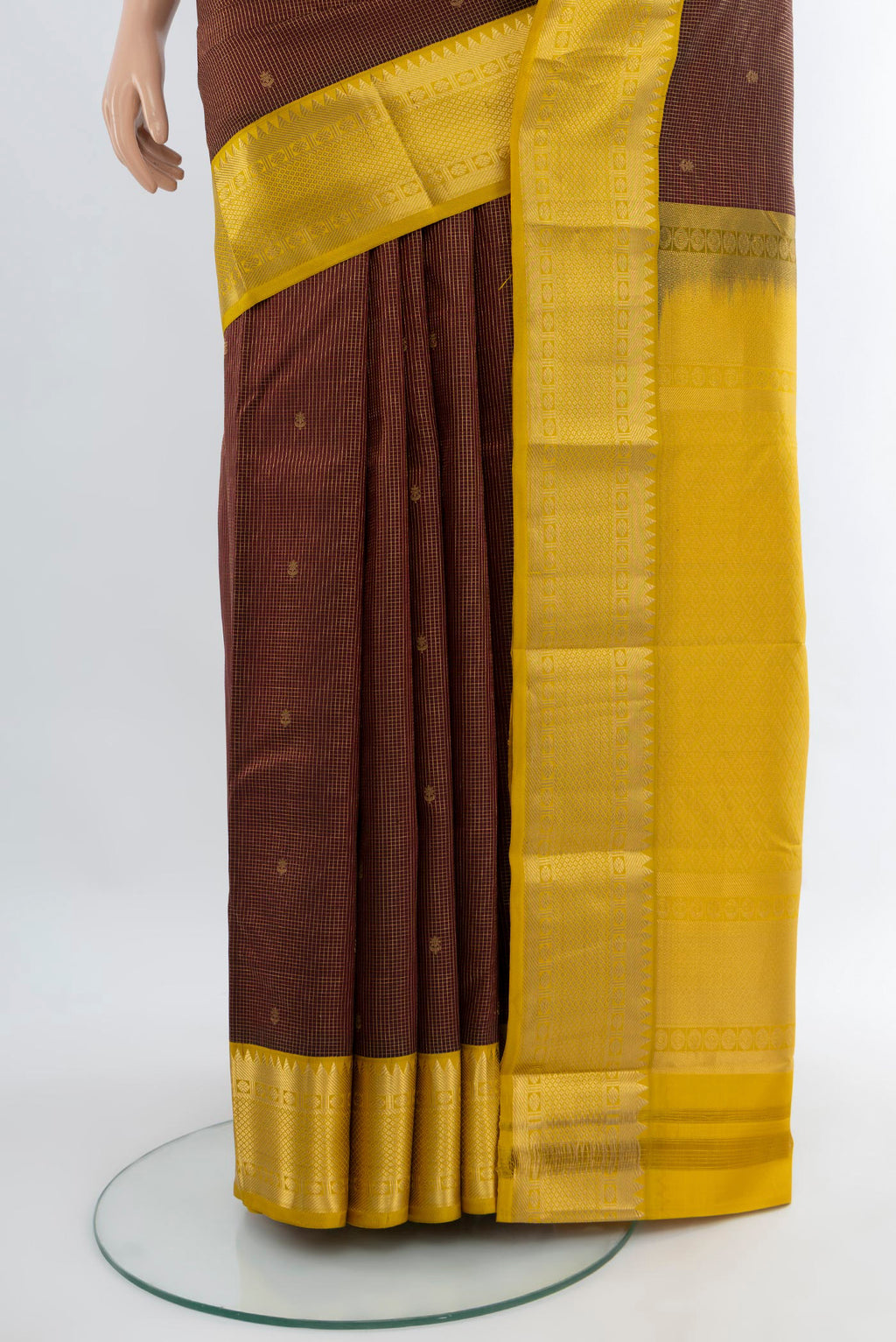 Pleats and pallu of Coffee Brown Kanjivaram Silk Saree with Zari Butta on the body and Zari Border. 