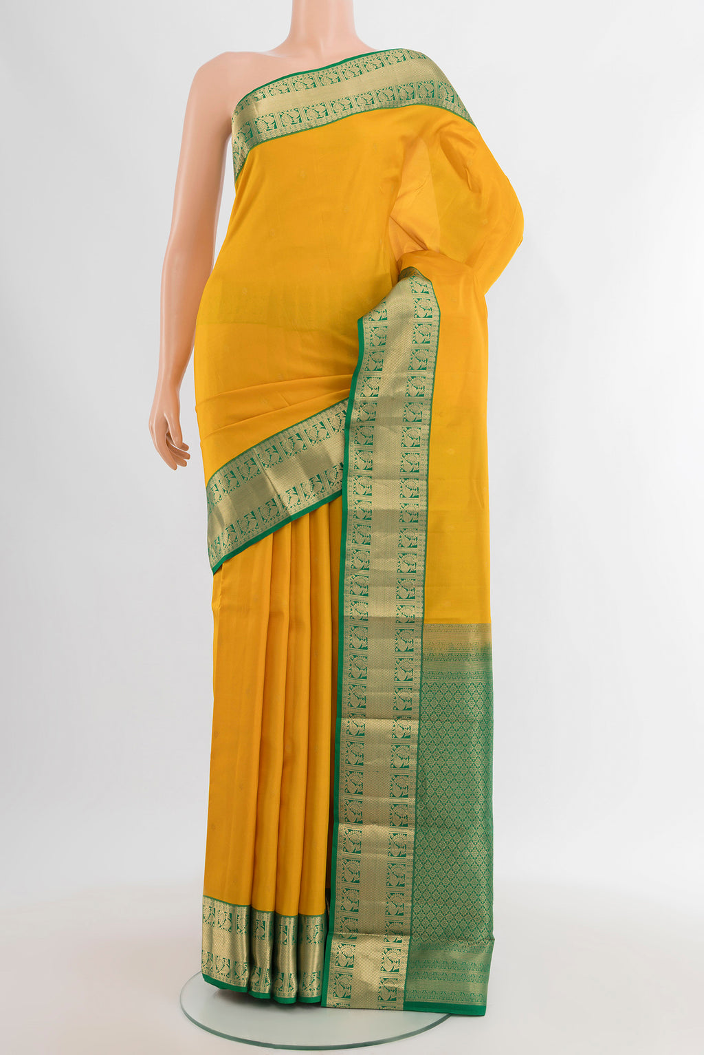 Yellow Kanchipuram Silk Saree with Zari Butta on the body and Zari Border.  displayed on a mannequin