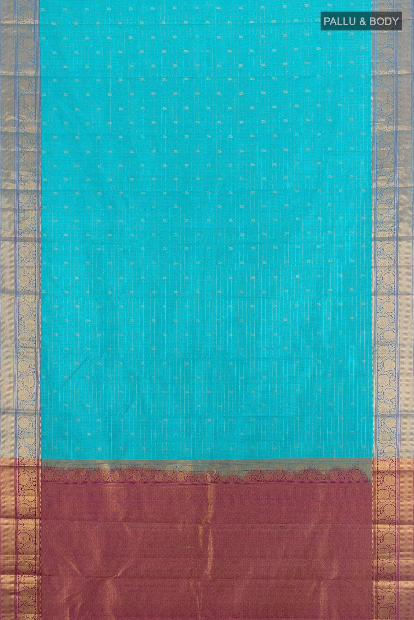 Flat view of Sky Blue Kanchipuram Silk Saree with Zari Butta on the body and Zari Border. 