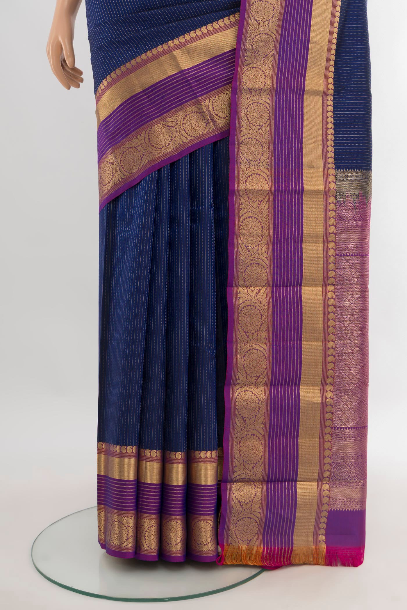 Pleats and pallu of Dark Blue Kanjivaram Silk Saree with Stripes on the body and Zari Border. 