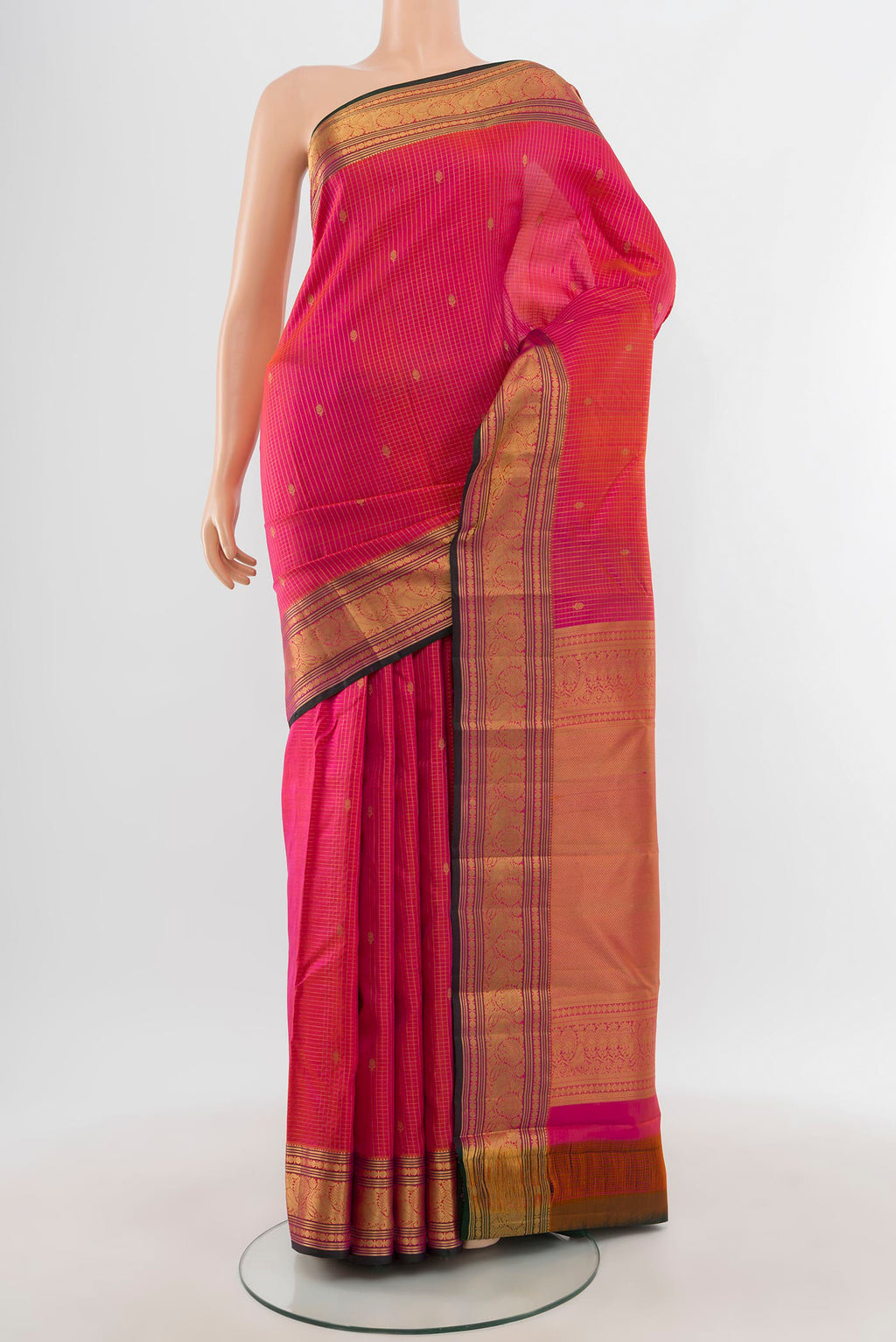 Pink Kanchipuram Silk Saree with Zari Butta on the body and Zari Border.  displayed on a mannequin