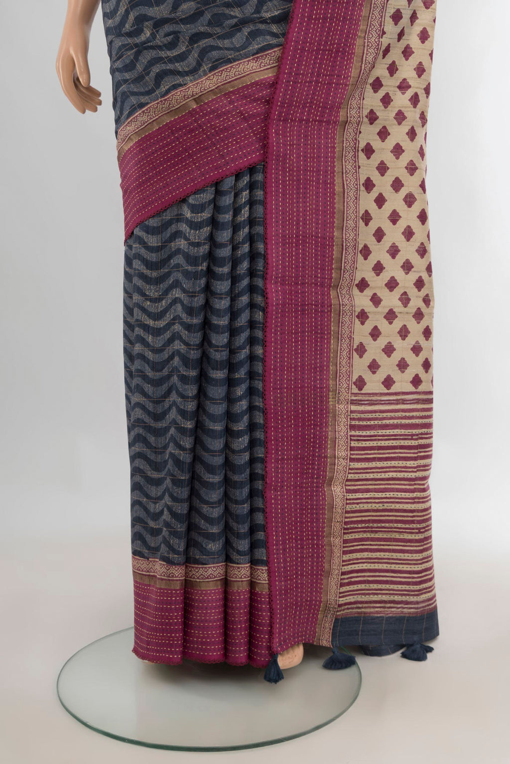 Pleats and pallu of Pure Silk Blue Tussar Saree with Printed design on the body and Plain Border. 