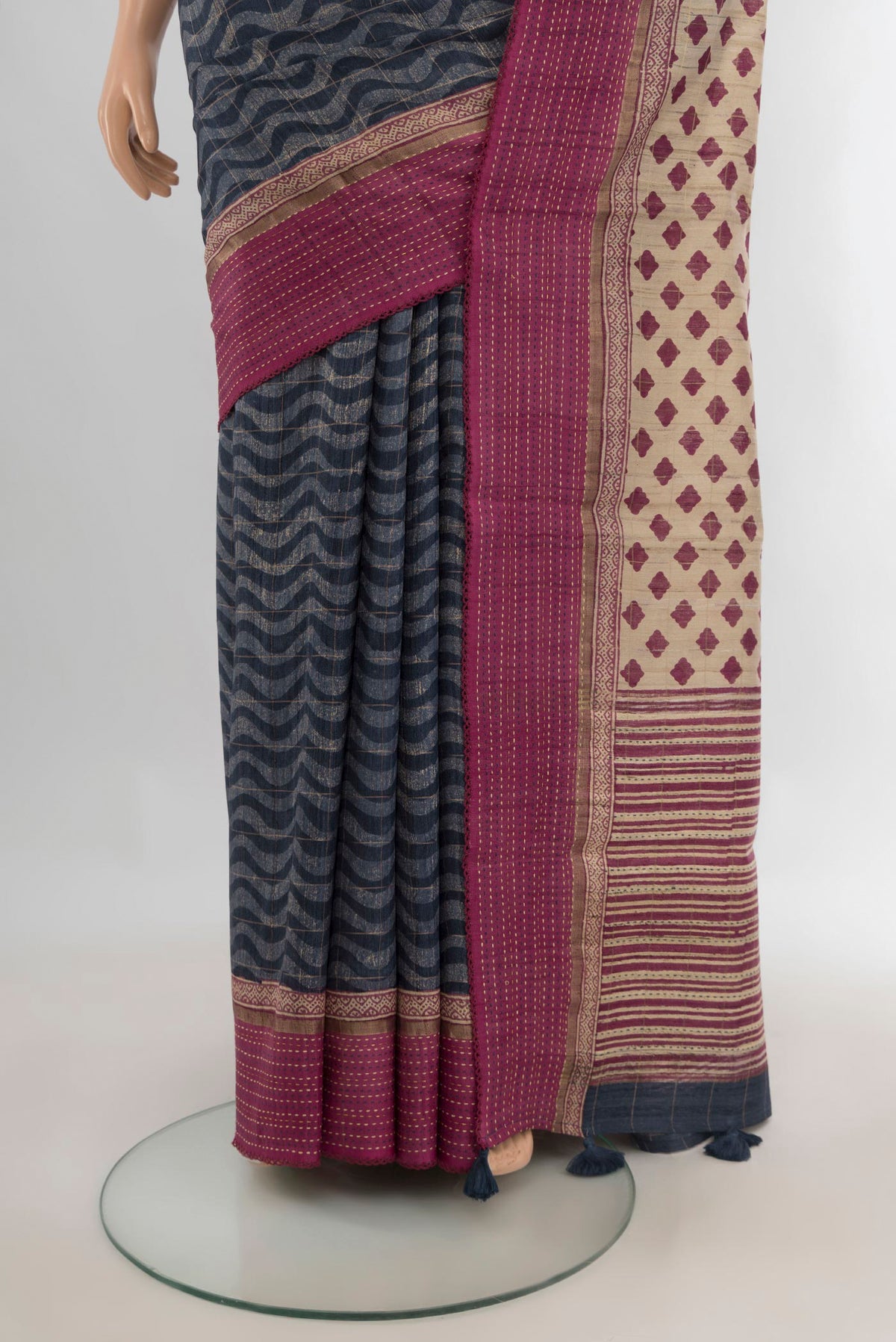 Pleats and pallu of Pure Silk Blue Tussar Saree with Printed design on the body and Plain Border. 