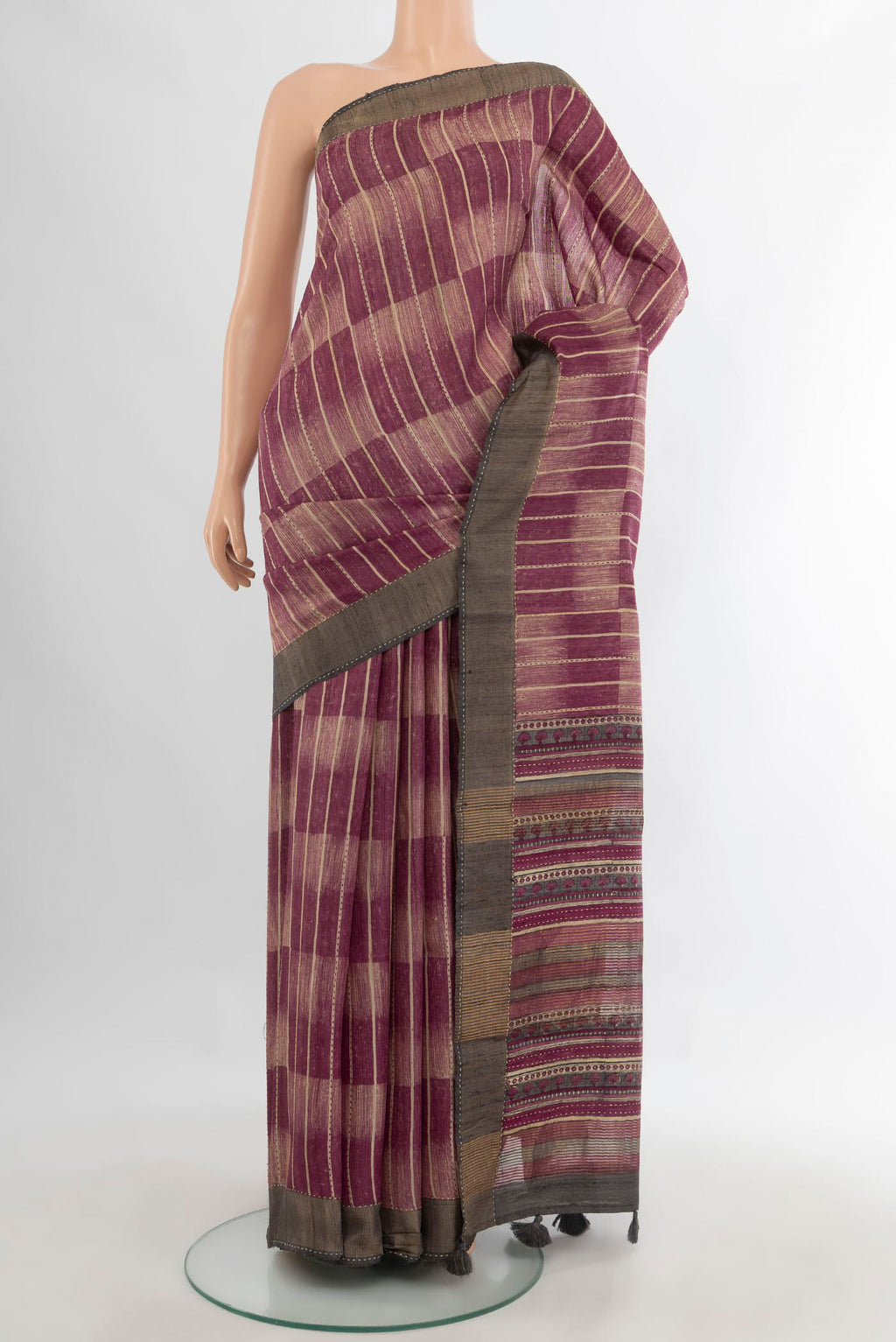 Multi Color Tussar Saree with Printed design on the body and Zari Border.  displayed on a mannequin
