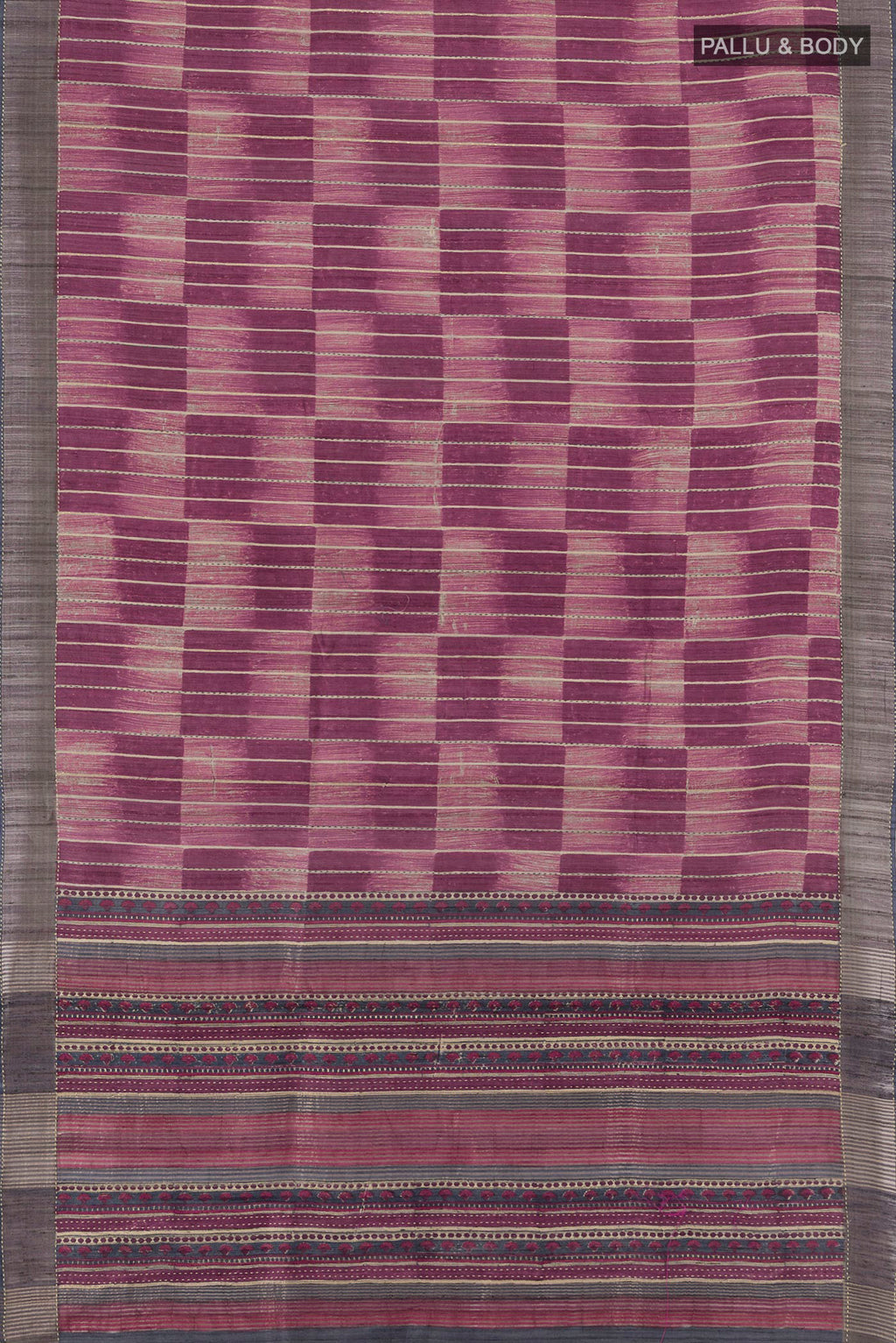 Flat view of Purple Tussar Silk Saree with Printed design on the body and Zari Border. 