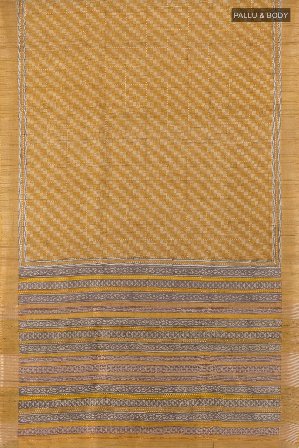 Flat view of Mustard Tussar Saree with Embroidery on the body and Zari Border. 