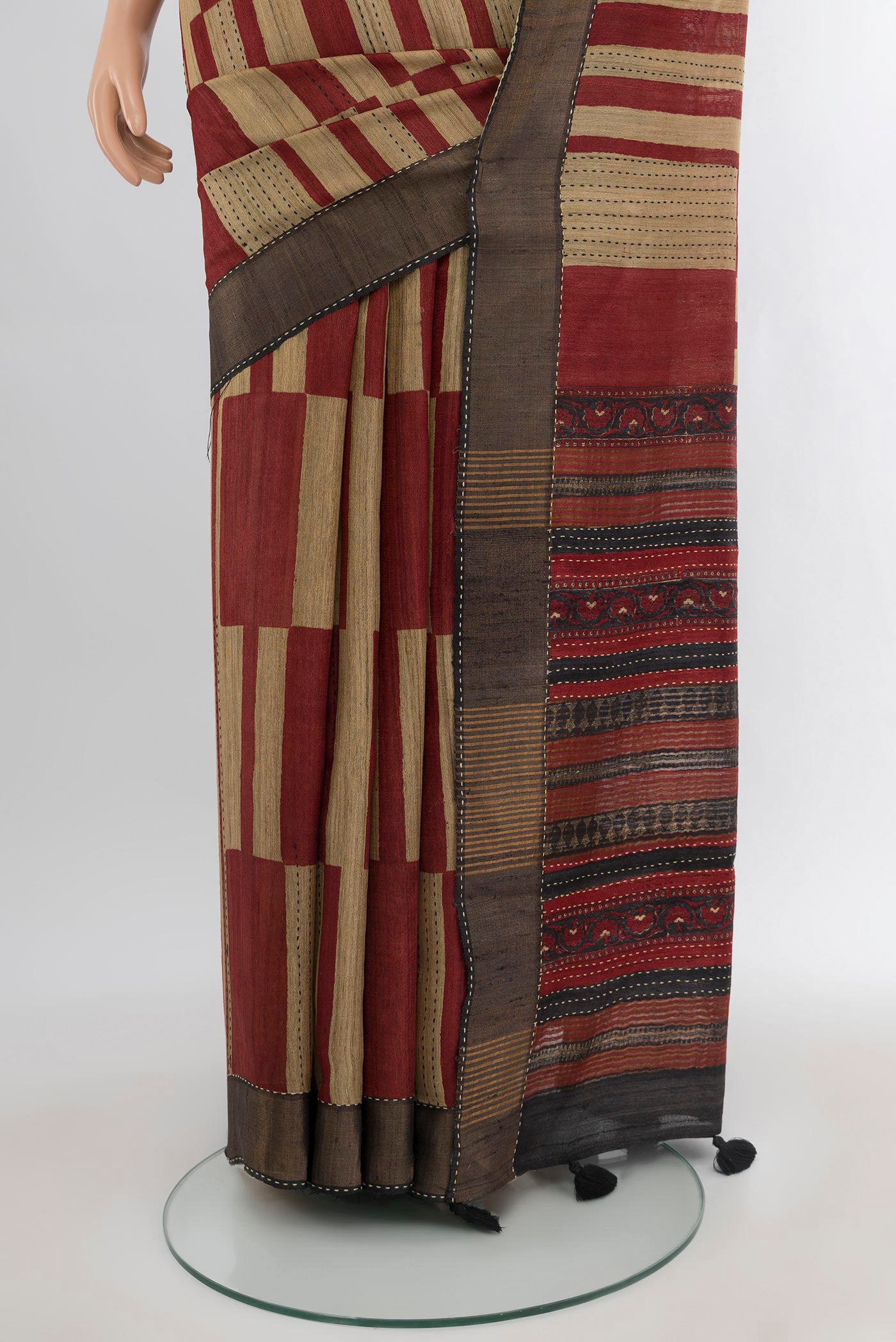 Pleats and pallu of Multi Color Tussar Silk Saree with Printed design on the body and Zari Border. 