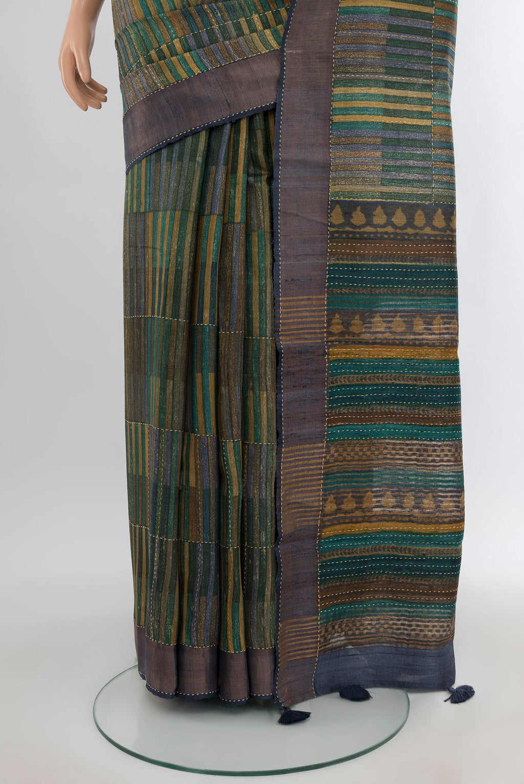 Pleats and pallu of Multi Color Tussar Silk Saree with Geometric Print on the body and Zari Border. 