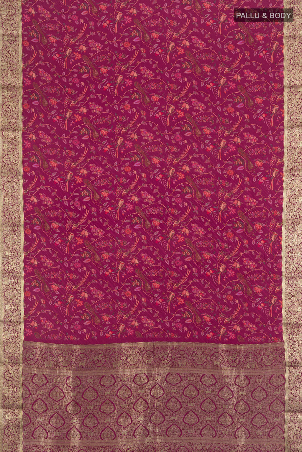 Flat view of Magenta Crepe Saree with Floral Print on the body and Zari Border. 