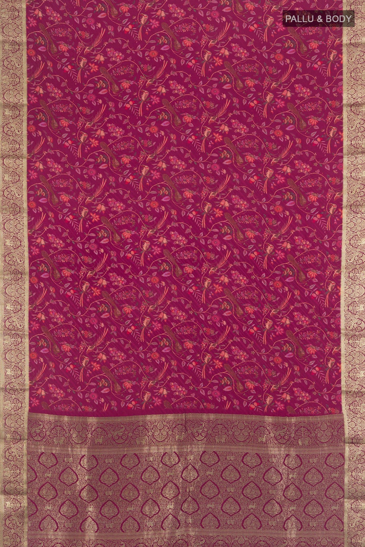 Flat view of Magenta Crepe Saree with Floral Print on the body and Zari Border. 