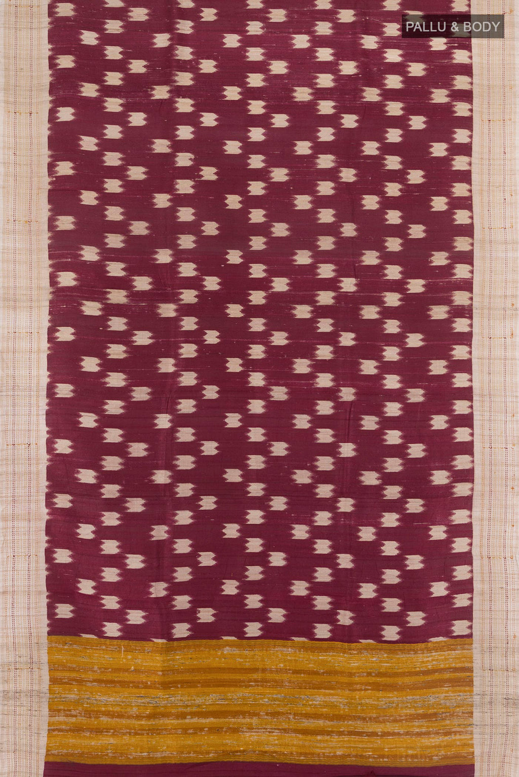 Flat view of Brown Tussar Saree with Printed design on the body and Plain Border. 