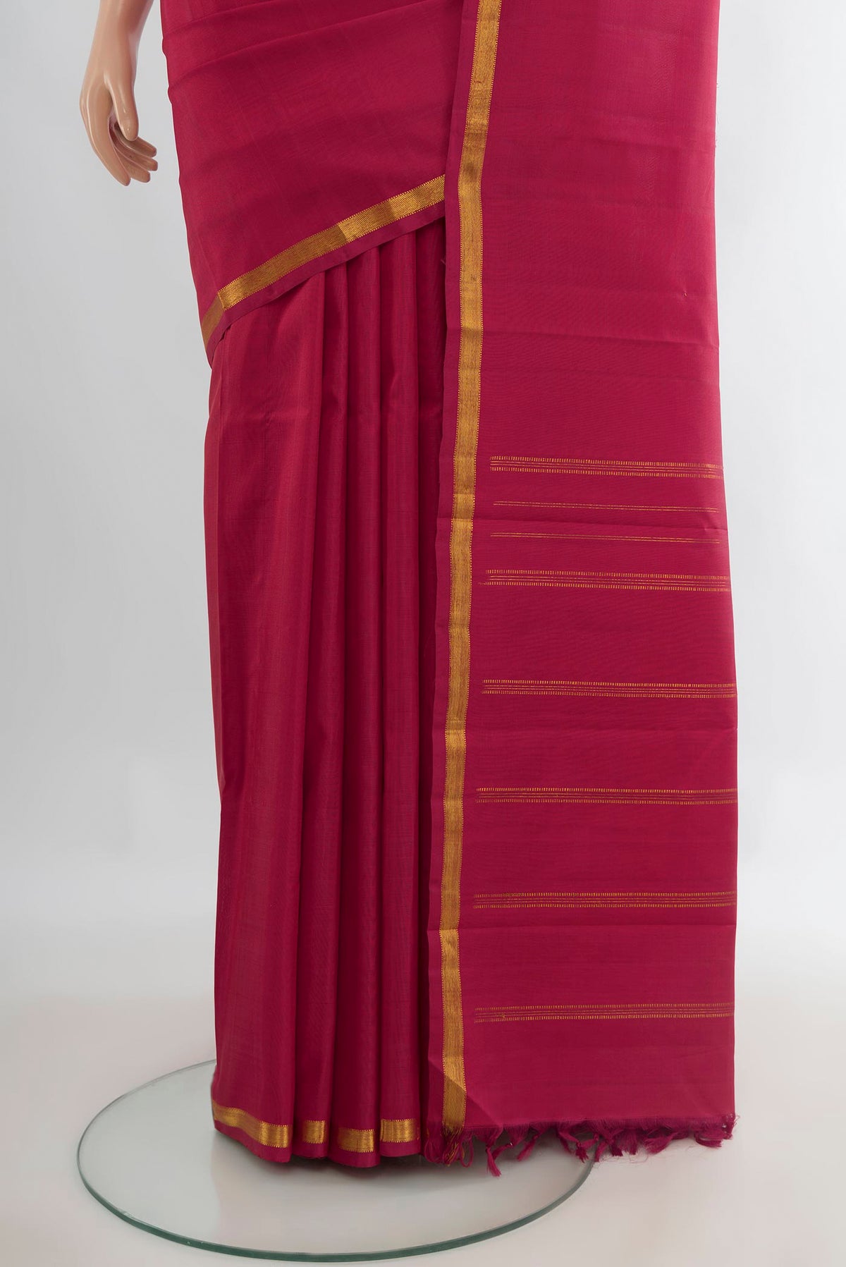 Pleats and pallu of Pure Silk Red Kanjivaram Saree with Plain Body and Silk Border. 
